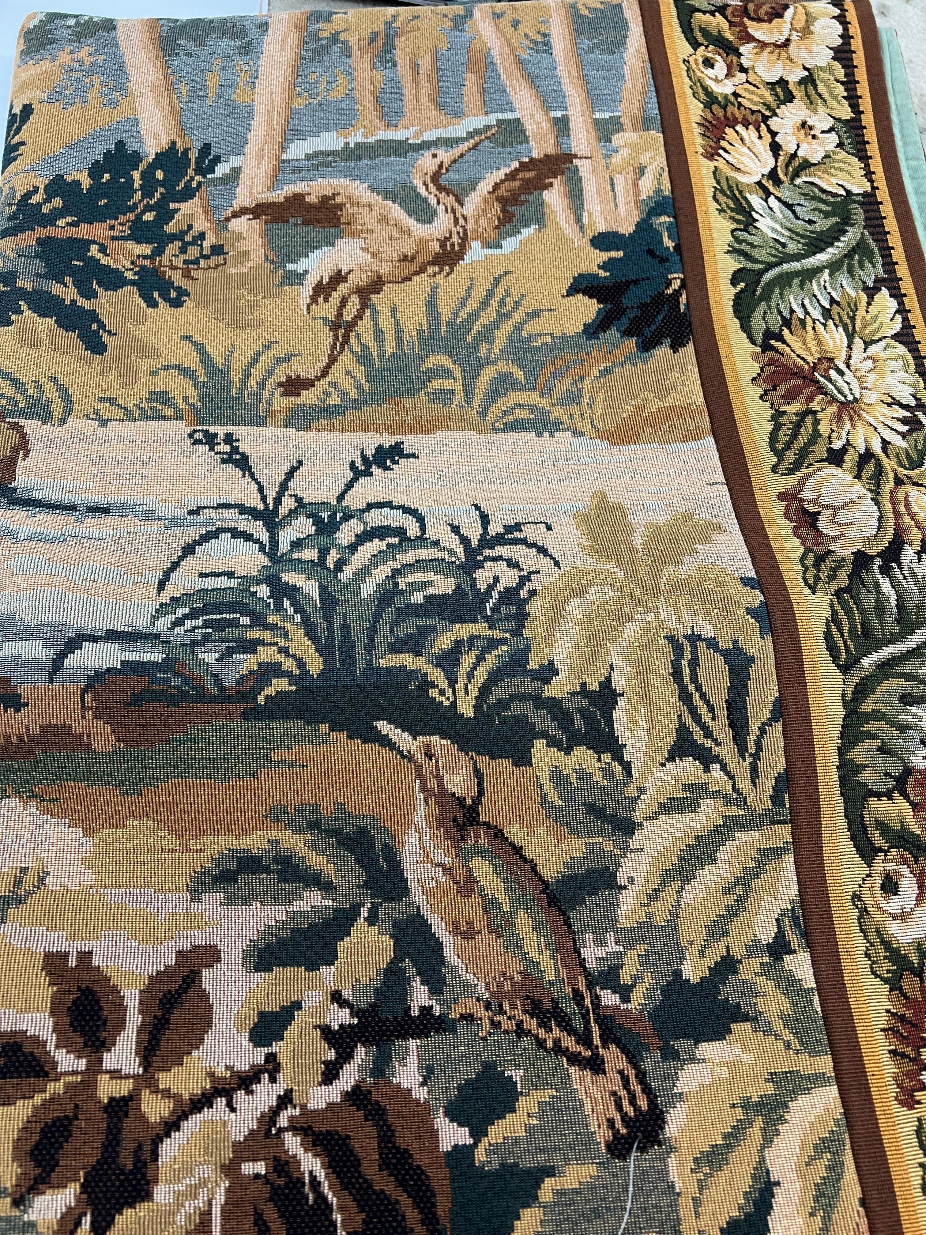 This tapestry is inspired from a fine example of a classical Verdure Tapestry, such as those woven in France, Brussels and Flanders during the 18th Century. Many Verdure Tapestries were woven throughout the 16th to 18th Centuries, with designs based