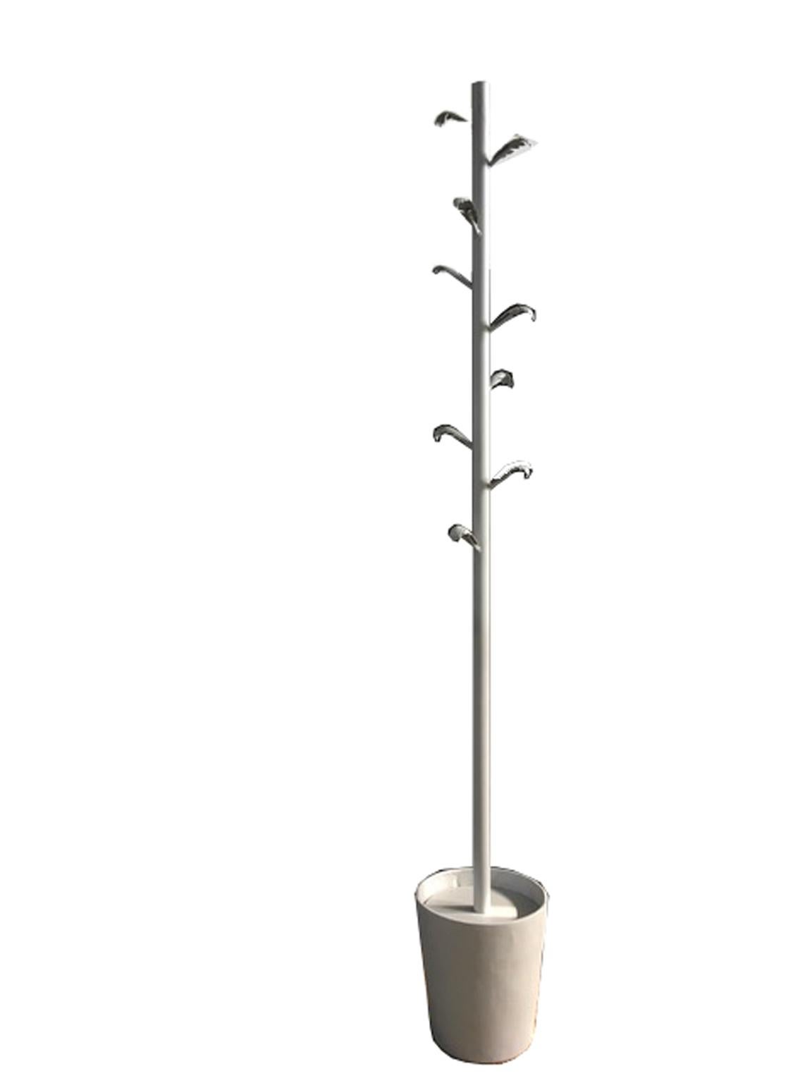 Ugo la Pietra is a very eclectic Italian artist and architect; this is an abstract sculpture cast in iron and aluminum that reproduces the imagine of a tree and that becomes a clothes hangers.

N. 15 multiples existing

