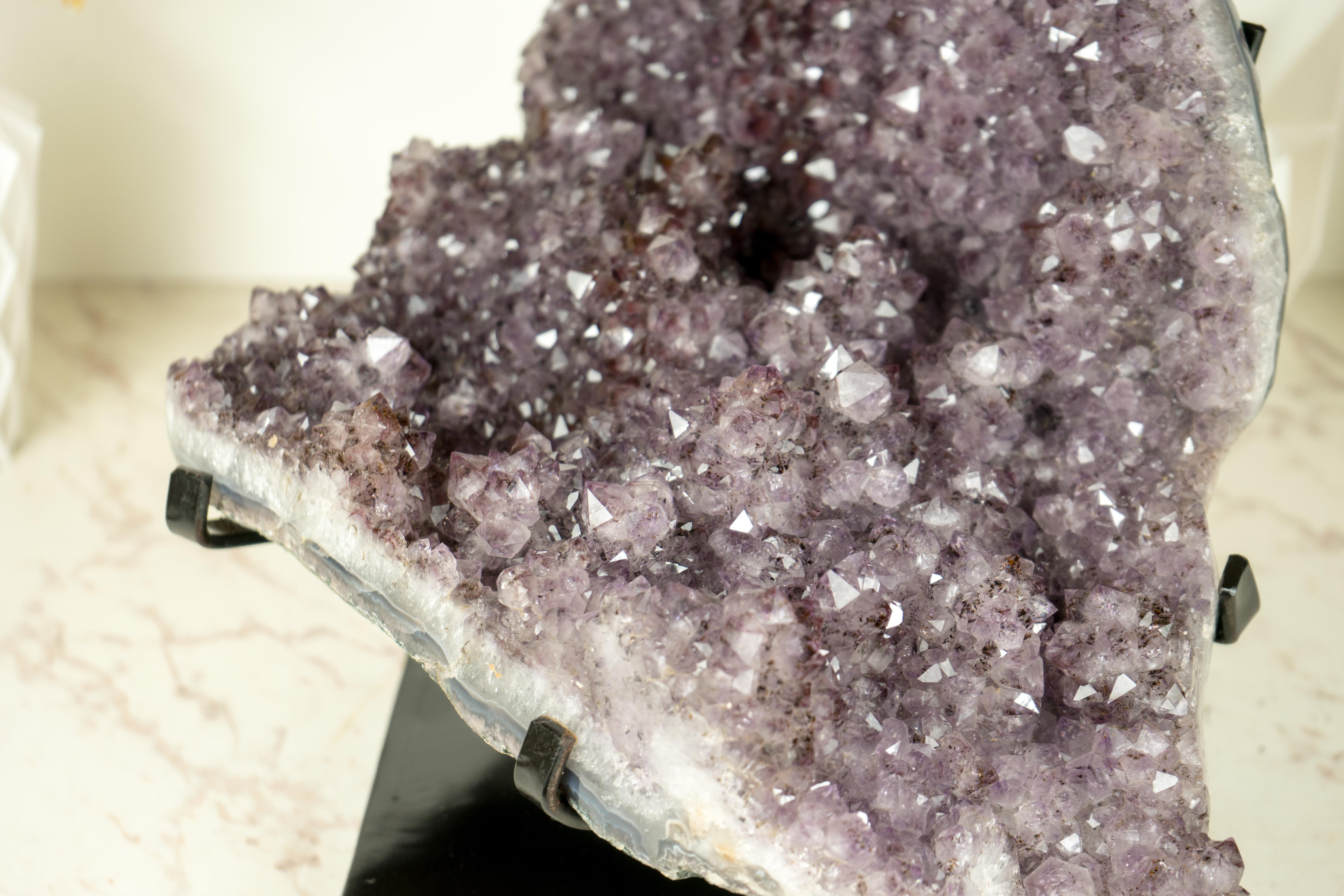 Natural Amethyst with Large Stalactite Formations covered by Intact Lavender Purple Druzy with Goethite 

▫️ Description

An incredible Amethyst specimen showcasing dozens of perfectly intact Amethyst Stalactites and gorgeous aesthetics, this