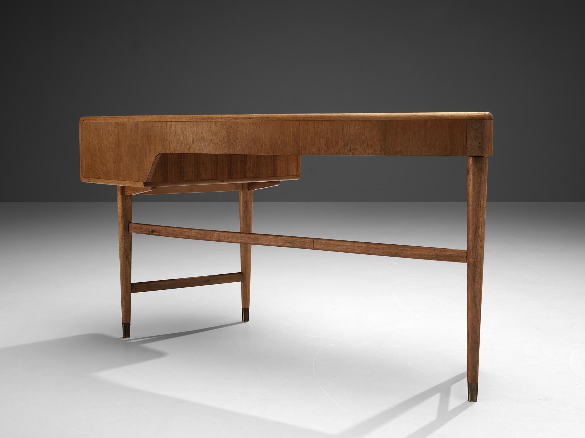A.A. Patijn for Zijlstra Meubelen, desk, walnut, brass, the Netherlands, 1950s

Rare desk by Abraham Patijn for Dutch manufacturer Zijlstra Meubelen. Patijn proves his eye for proportions and shapes, yet not leaving functionality behind. The desk is