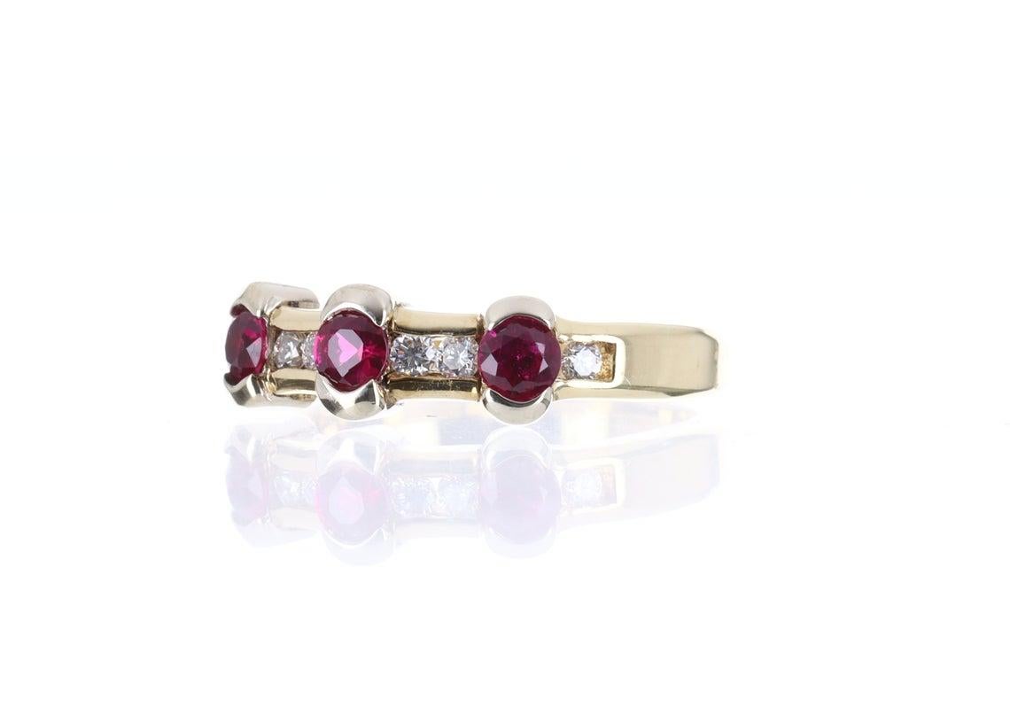 One of natures rare beauties, a pigeon blood ruby and diamond band. This ring band is quite a luxurious work of art and a true showstopper. Expertly handcrafted in gleaming 14k solid, yellow gold; this ring features 100% genuine, AAA+ quality, Burma