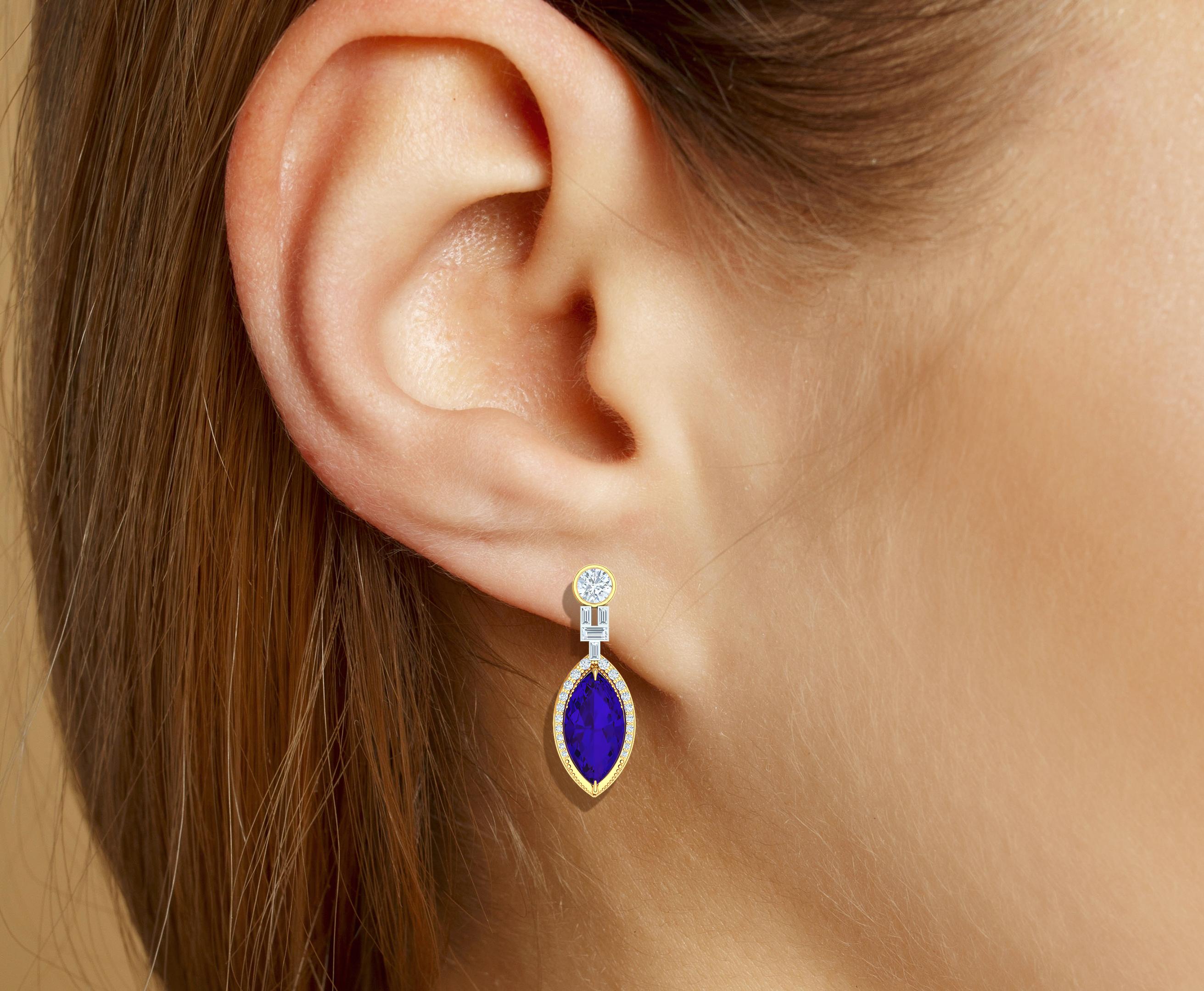These stunning rich purple are of the finest quality Tanzanite in the world.  These earrings feature two matching rare marquise cut Tanzanite a shape not often cut and therefore very rare.  The color stunning!  The color is a rich violet purple blue