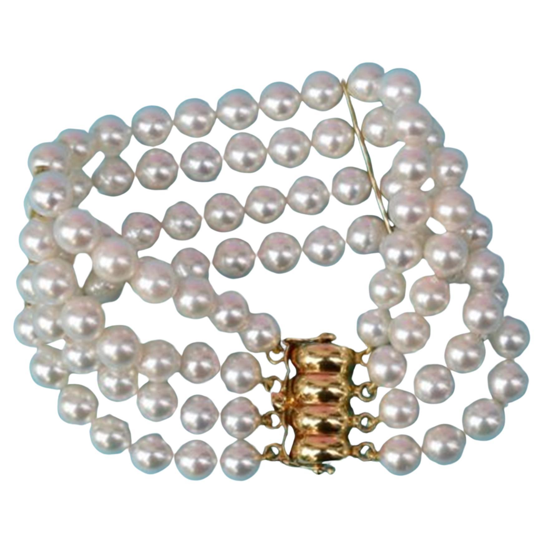 AAA+ Akoya Three Row Pearls 18k Yellow Gold Bracelet In New Condition For Sale In Chicago, IL