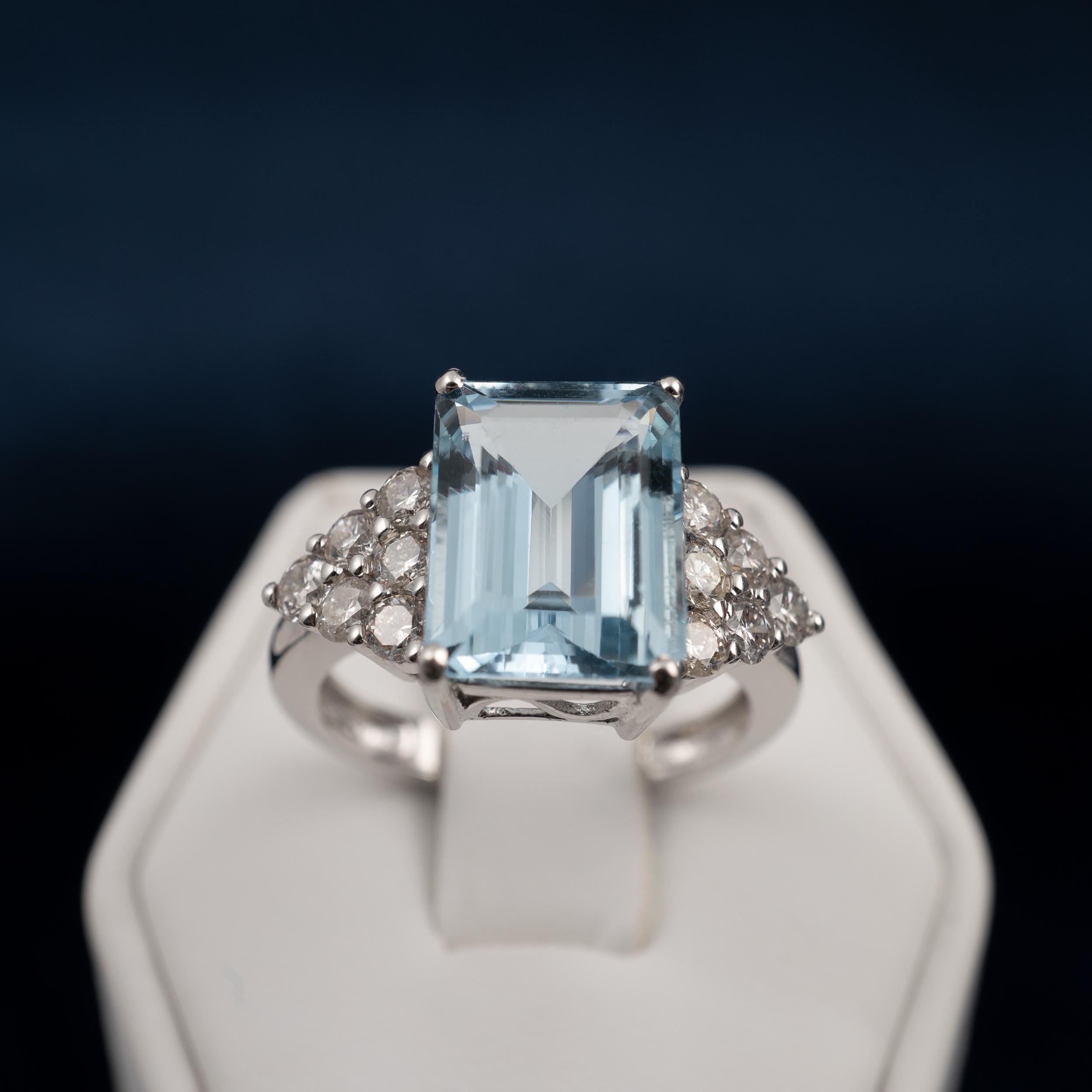 An impressive 5-carat aquamarine and diamond statement ring is made in 18 karat white gold and features a rare loop clear natural aquamarine gemstone.

Crafted by our expert artisan jewelers, this mesmerizing ring features an octagon step cut
