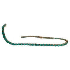AAA+ Colombian Emerald Oval Tennis Necklace set in 18k Yellow Gold