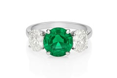 AAA  Emerald and Diamond Three-Stone Engagement Ring