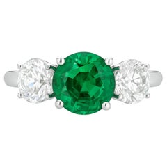 AAA  Emerald and Diamond Three-Stone Engagement Ring
