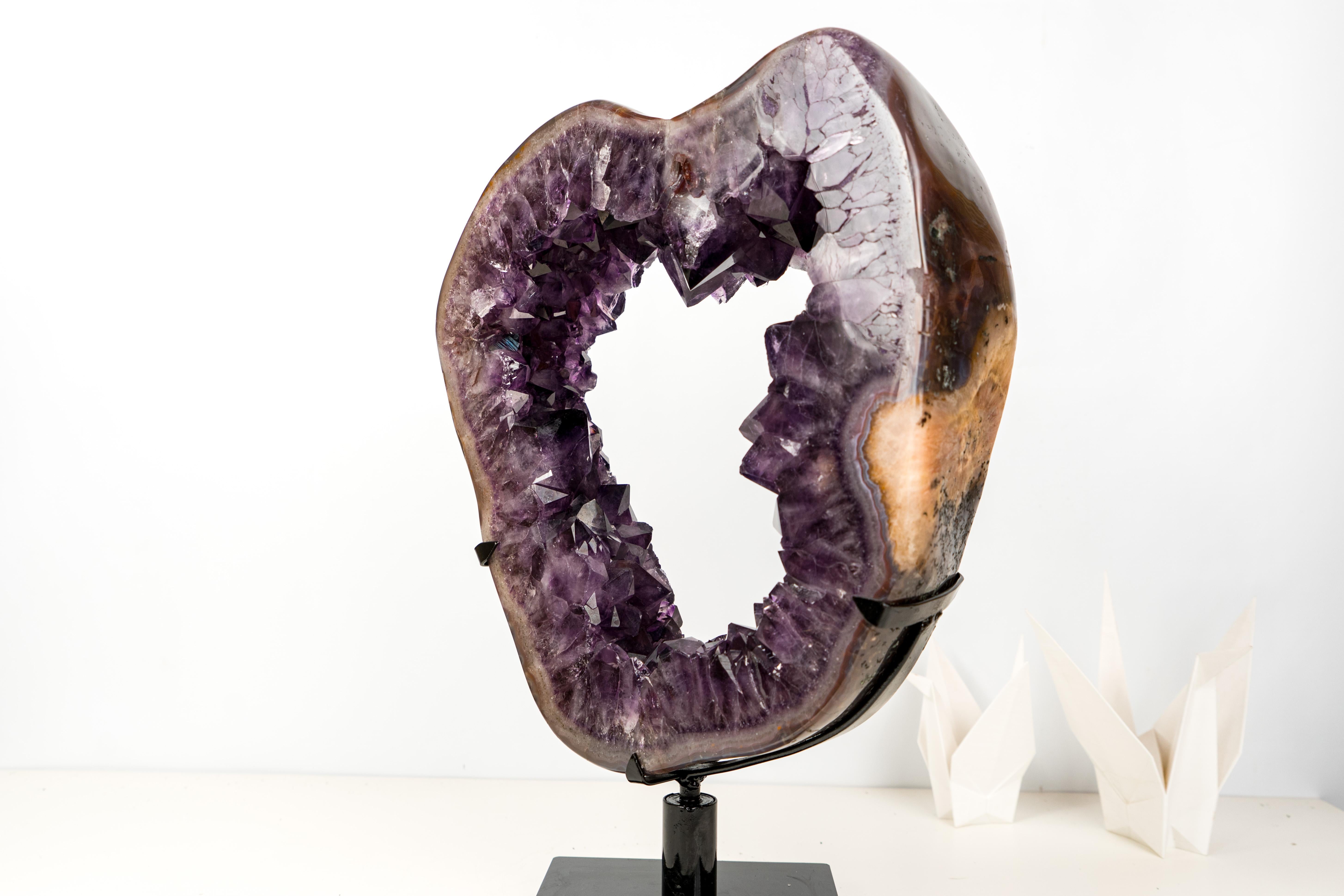 Geode di ametista Portales con cristalli viola di grado AAA - pezzo forte per l'arredamento di lusso o per le collezioni di minerali pregiati

▫️ Descrizione

Un superbo Geode Portales di ametista, questo capolavoro naturale mostra un'estetica di