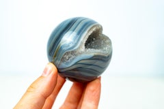 AAA-Grade Blue Banded Agate Sphere with Druzy Cave