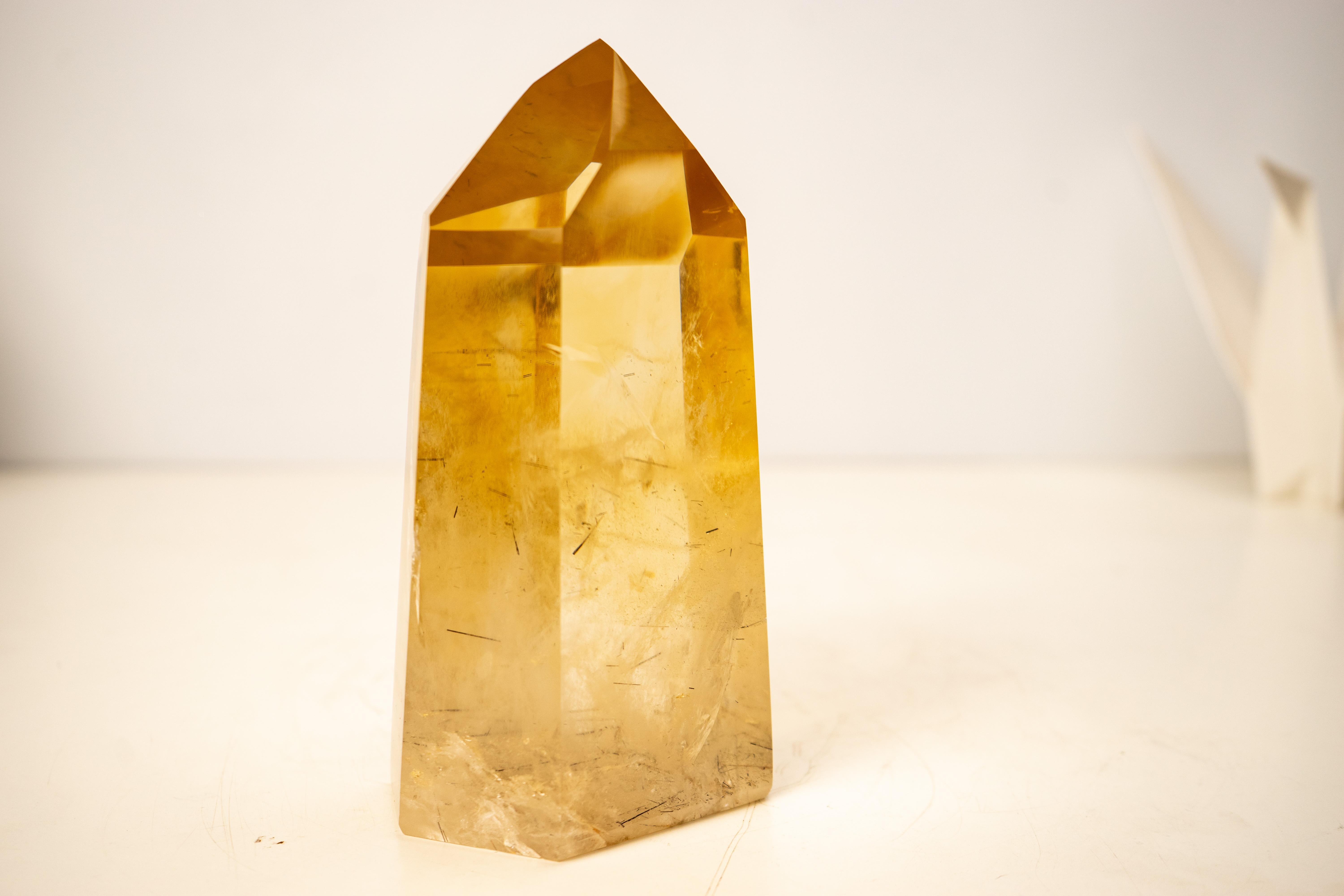 Spectacular AAA-Grade Golden Honey Citrine Obelisk Tower with Graphite Rutile Inclusions

▫️ Description

Showcasing water-clear quartz with rare golden-orange tones, this Citrine Obelisk reveals striking graphite rutile inclusions and naturally