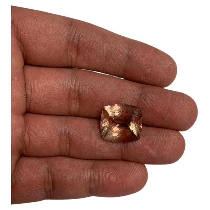 SKU - 60006
Stone : Natural Peach Morganite 
Shape - Cushion
Quality - 	Eye clean
Weight - 	13.72 Cts
Quality - 	AAA	
Length * Breadth * Height - 18*18*7.5

Morganite is a gemstone that brings the prism of love in all its incarnations. Morganite is