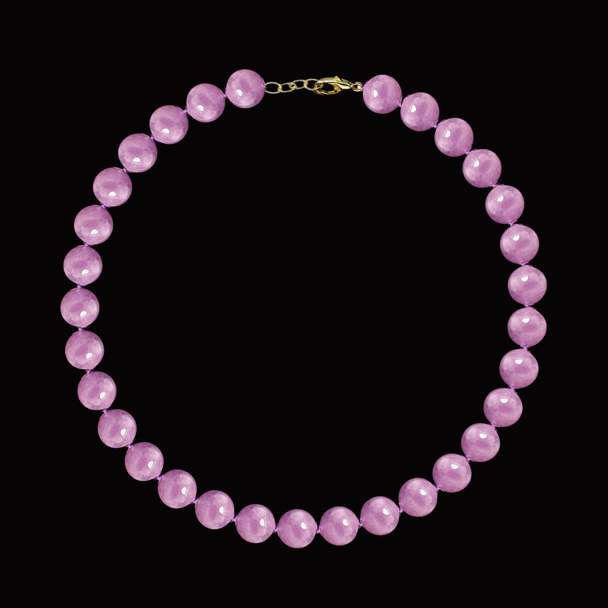 AAA Qualität Kunzite Bead Neckalce 
mit 14K Gelbgold Lock & Verlängerung
adustable Länge 15.5' - 17.5' Inches
Bead Größe: 10 mm 
Alle natürlichen Steine. 
Satter Violett-Ton - sehr klassisch 
+ Geschenkbox & Schätzung