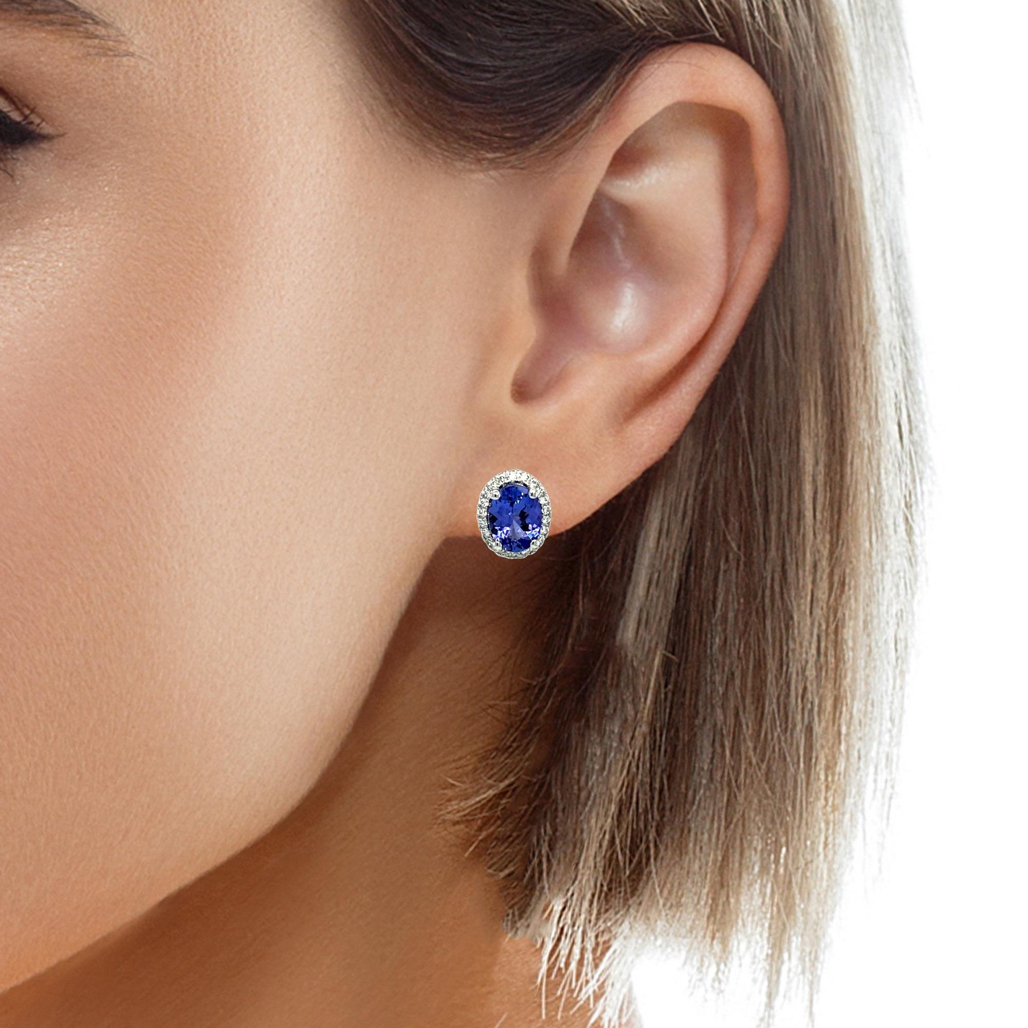 These stunning AAA quality oval Tanzanite and Diamond stud earrings are surrounded by shimmering diamonds. There is a double push lock for extra security. These earrings come in a beautiful box ready for the perfect gift!

14KW:            2.80