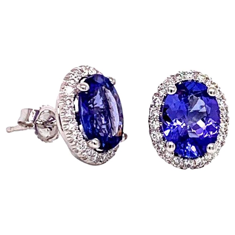 Clous d'oreilles AAA en or blanc 14 carats avec tanzanite ovale et diamants