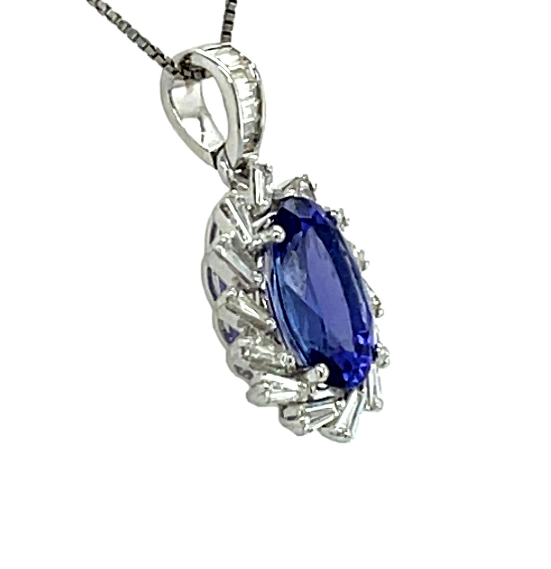 Oval Cut  AAA Oval Tanzanite and Diamond Pendant in 18KW Gold  For Sale