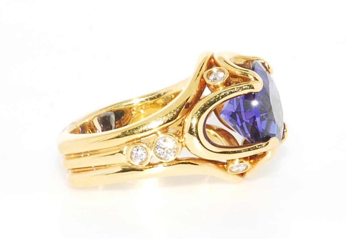 Women's AAA Quality Very Fine Tanzanite in 18 Karat Yellow Gold with Diamonds Accents For Sale