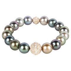 AAA Tahiti Pearl Bracelet with Two 18k Yellow Gold Diamond Encrusted Orbs