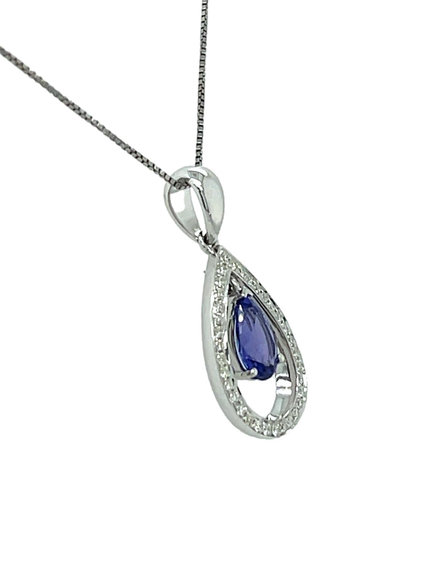 Pear Cut AAA Tanzanite and Diamond Halo Pendant in 18K White Gold For Sale
