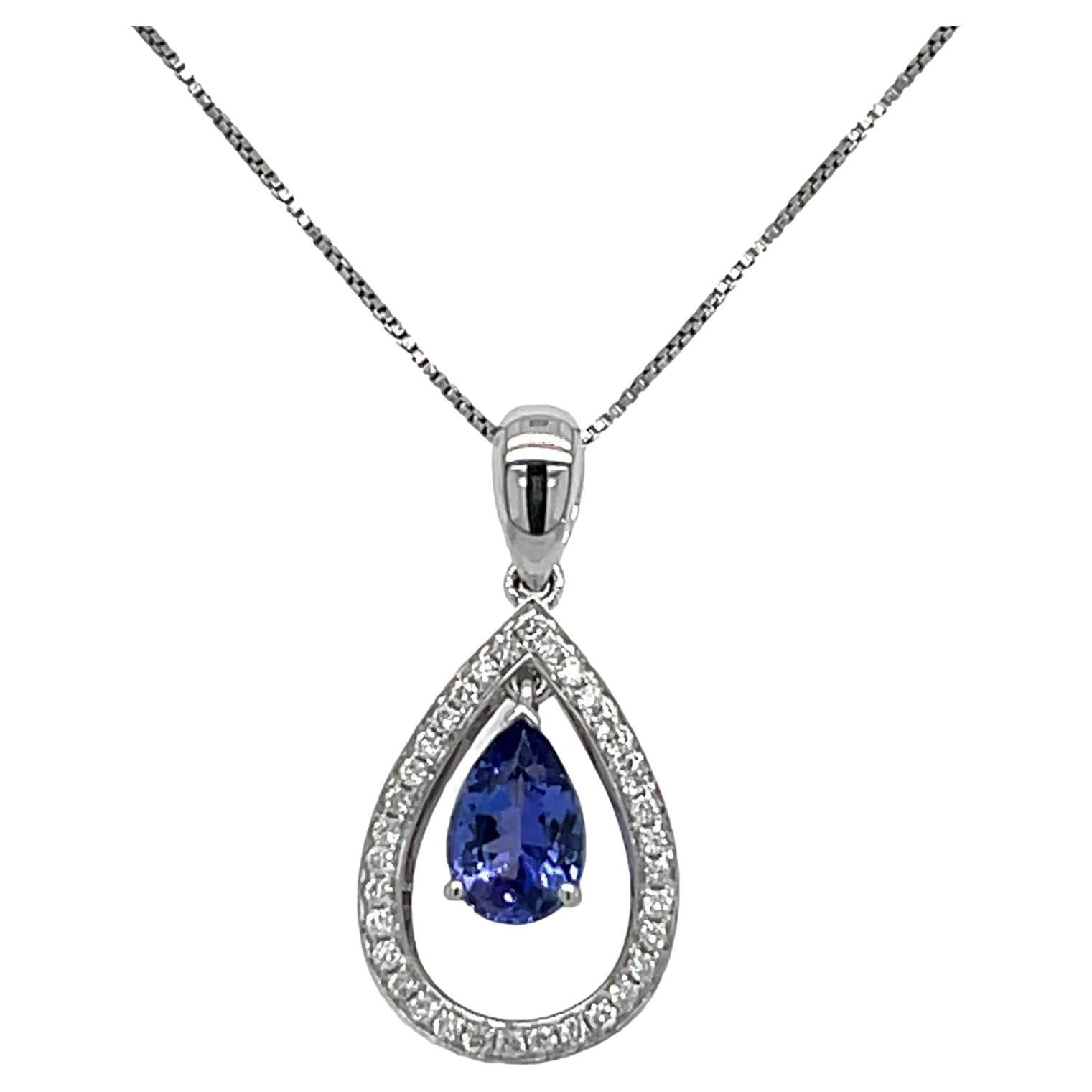 AAA Tanzanite and Diamond Halo Pendant in 18K White Gold  For Sale