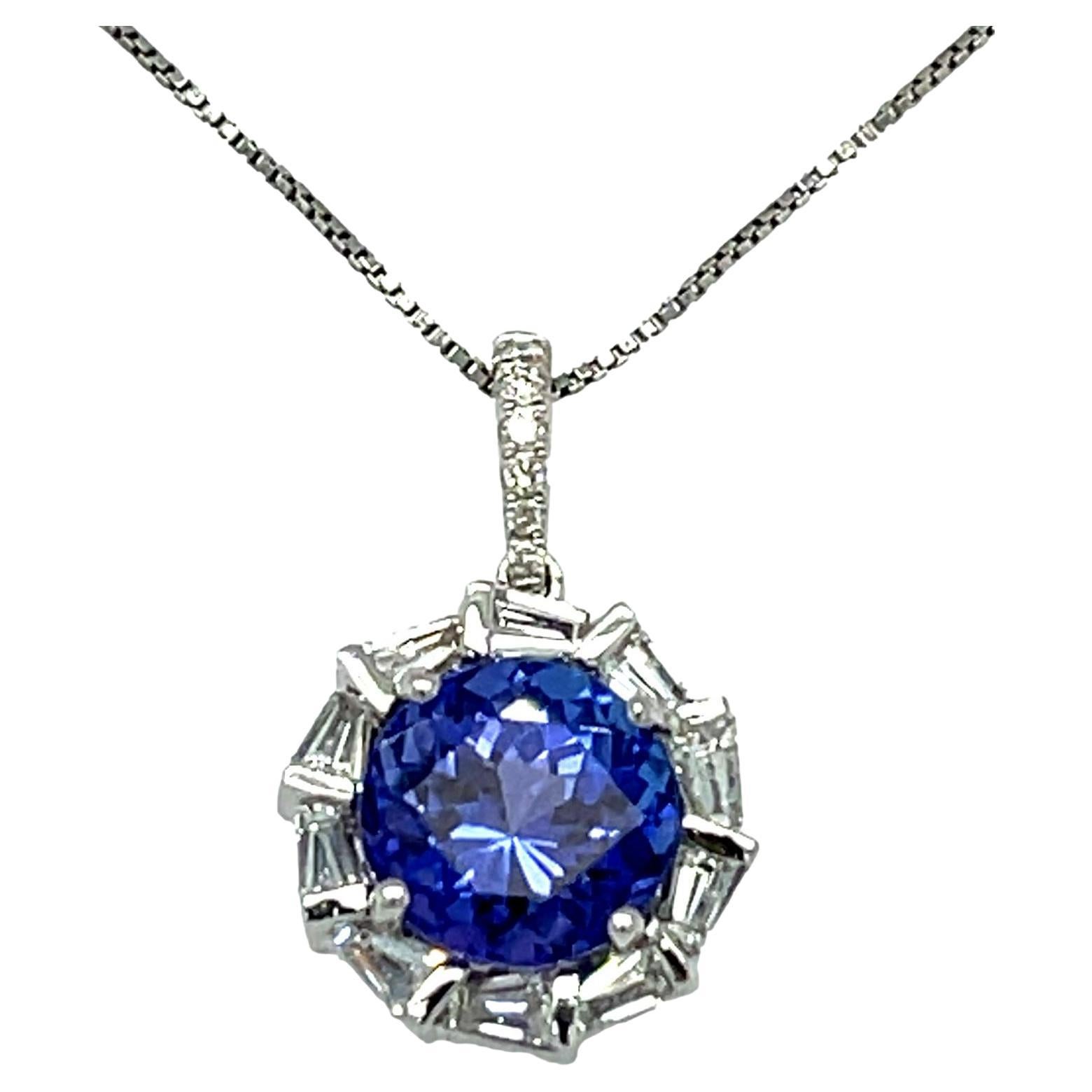 AAA Tanzanite and tapered Diamond Halo Pendant 18K White Gold  For Sale