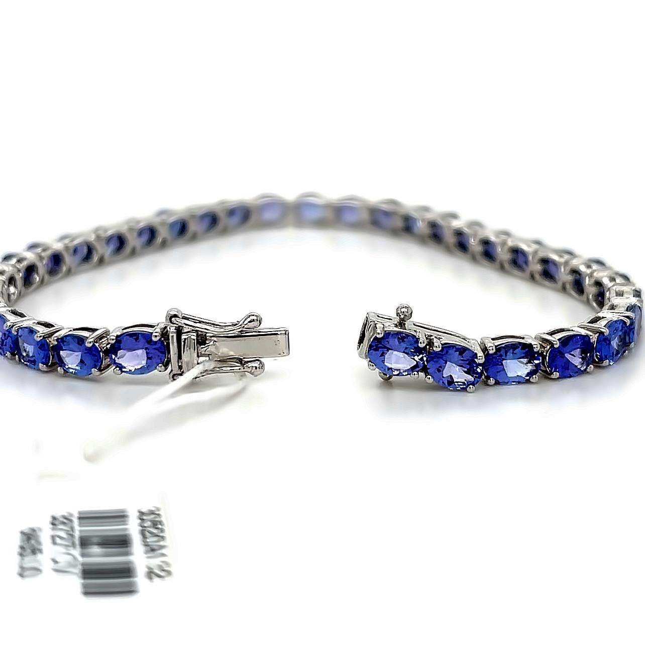 Women's or Men's AAA Tanzanite Tennis Bracelet in 18KW Gold  For Sale