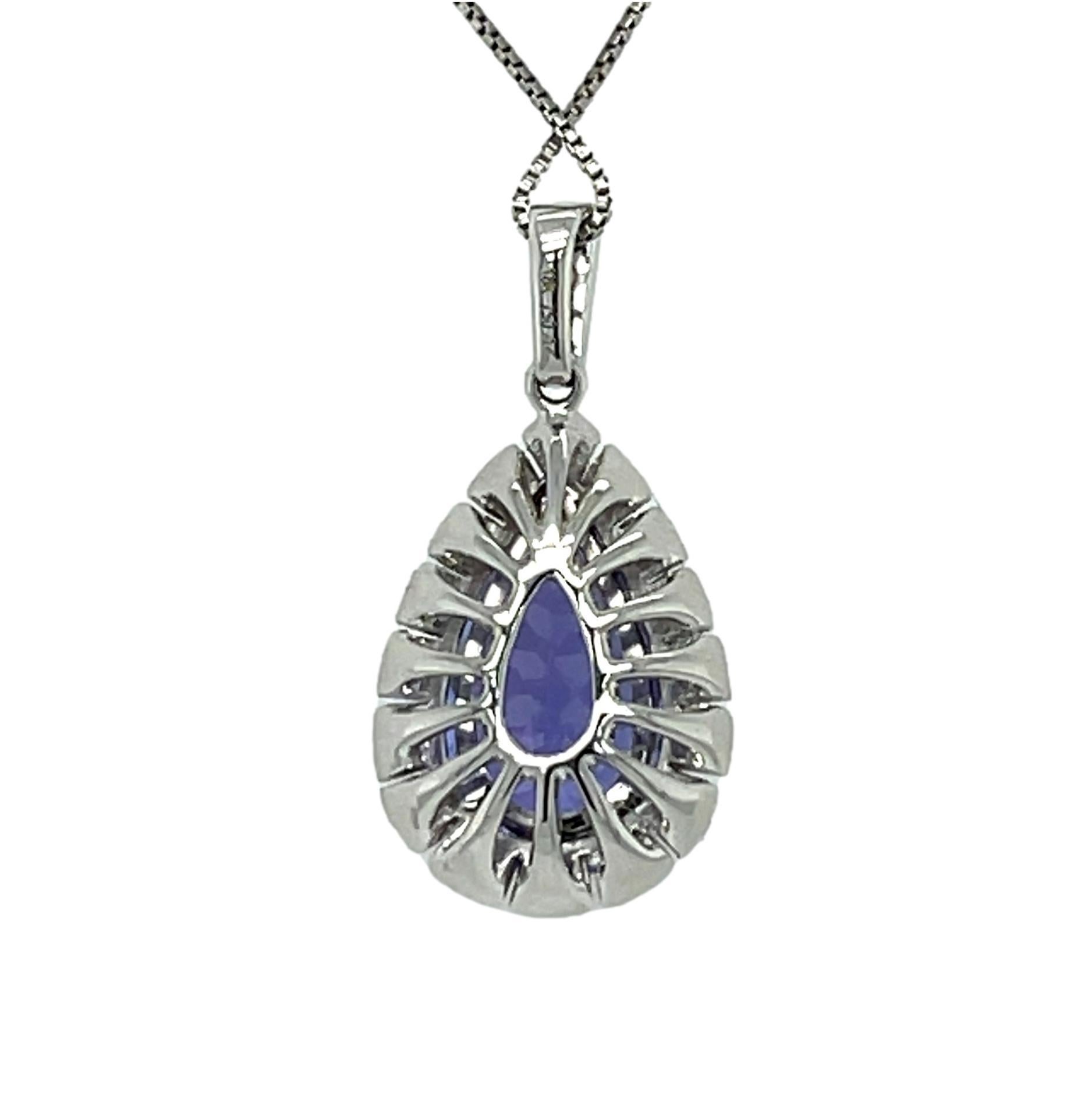 AAA Teardrop Tanzanite and Diamond Halo Pendant in 18KW Gold  In New Condition For Sale In New York, NY