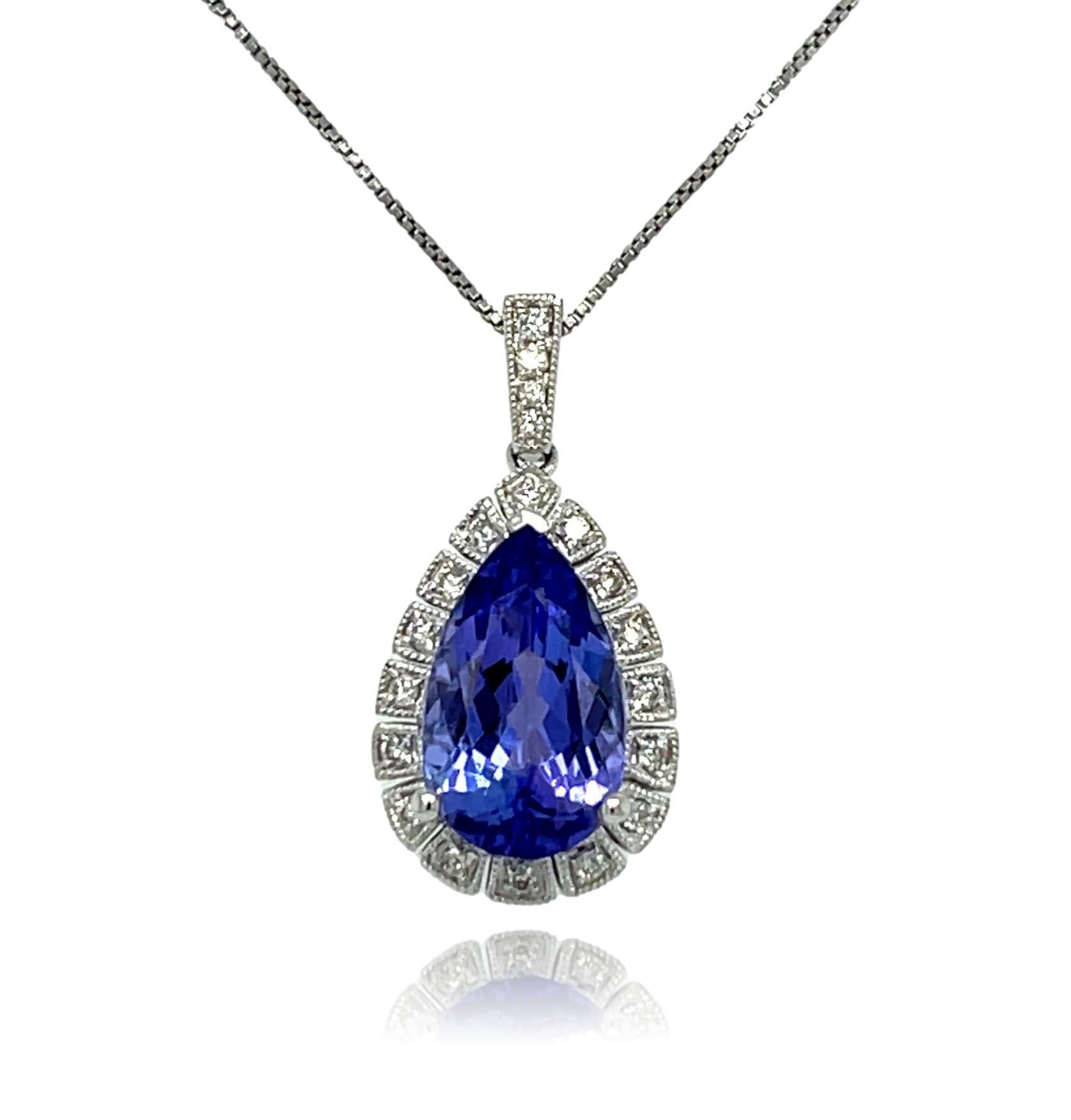 Women's AAA Teardrop Tanzanite and Diamond Halo Pendant in 18KW Gold  For Sale