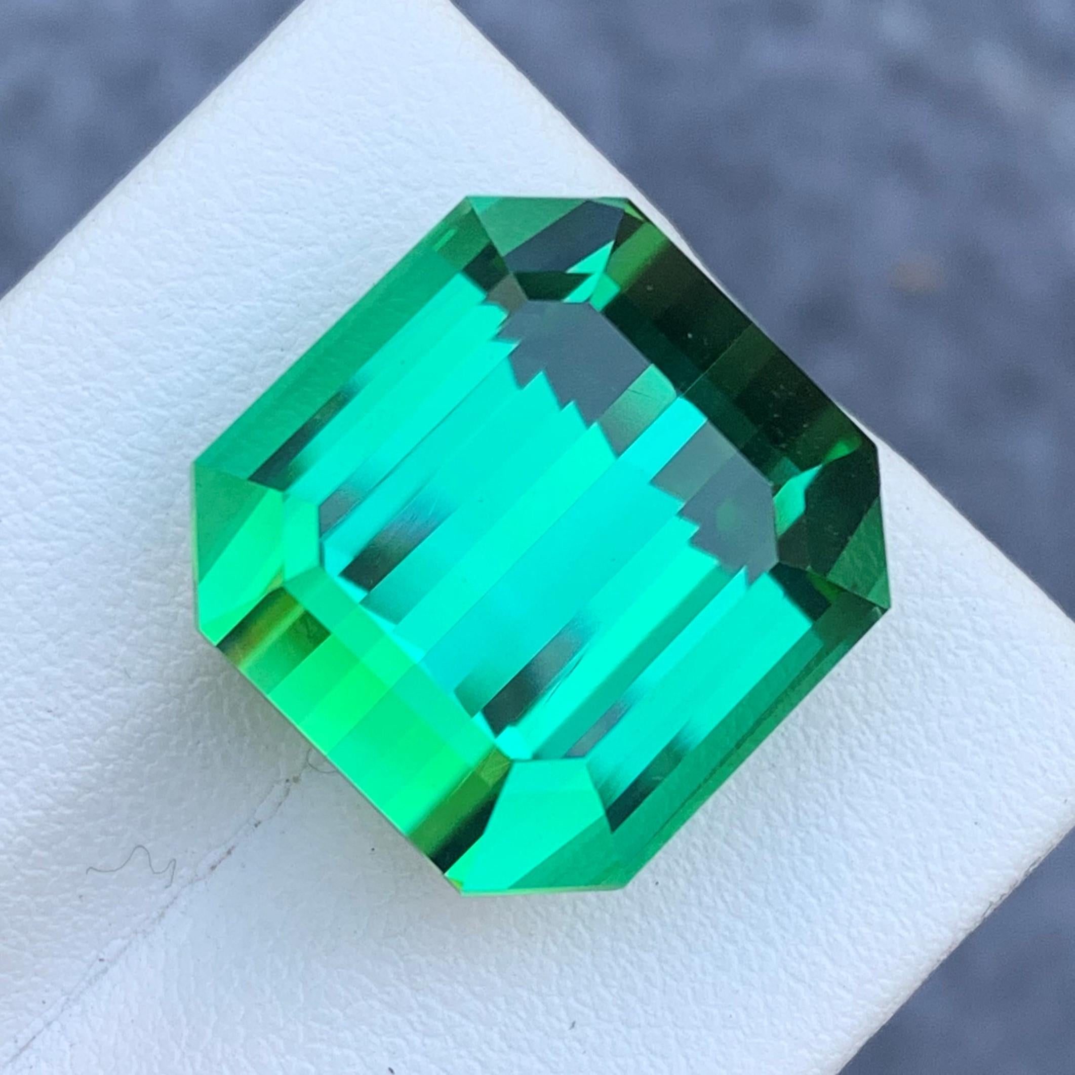 Gemstone Type : Tourmaline
Weight : 31.15 Carats
Dimensions : 17x16.6x12.9 Mm
Origin : Kunar Afghanistan
Clarity : Loupe Clean
Shape: Emerald
Color: Lagoon Green 
Certificate: On Demand
Basically, mint tourmalines are tourmalines with pastel hues of