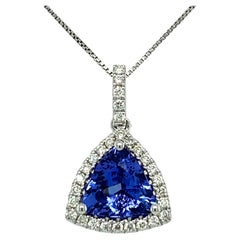 AAA Trillion Tanzanite and Diamond Halo Pendant in 18K White Gold