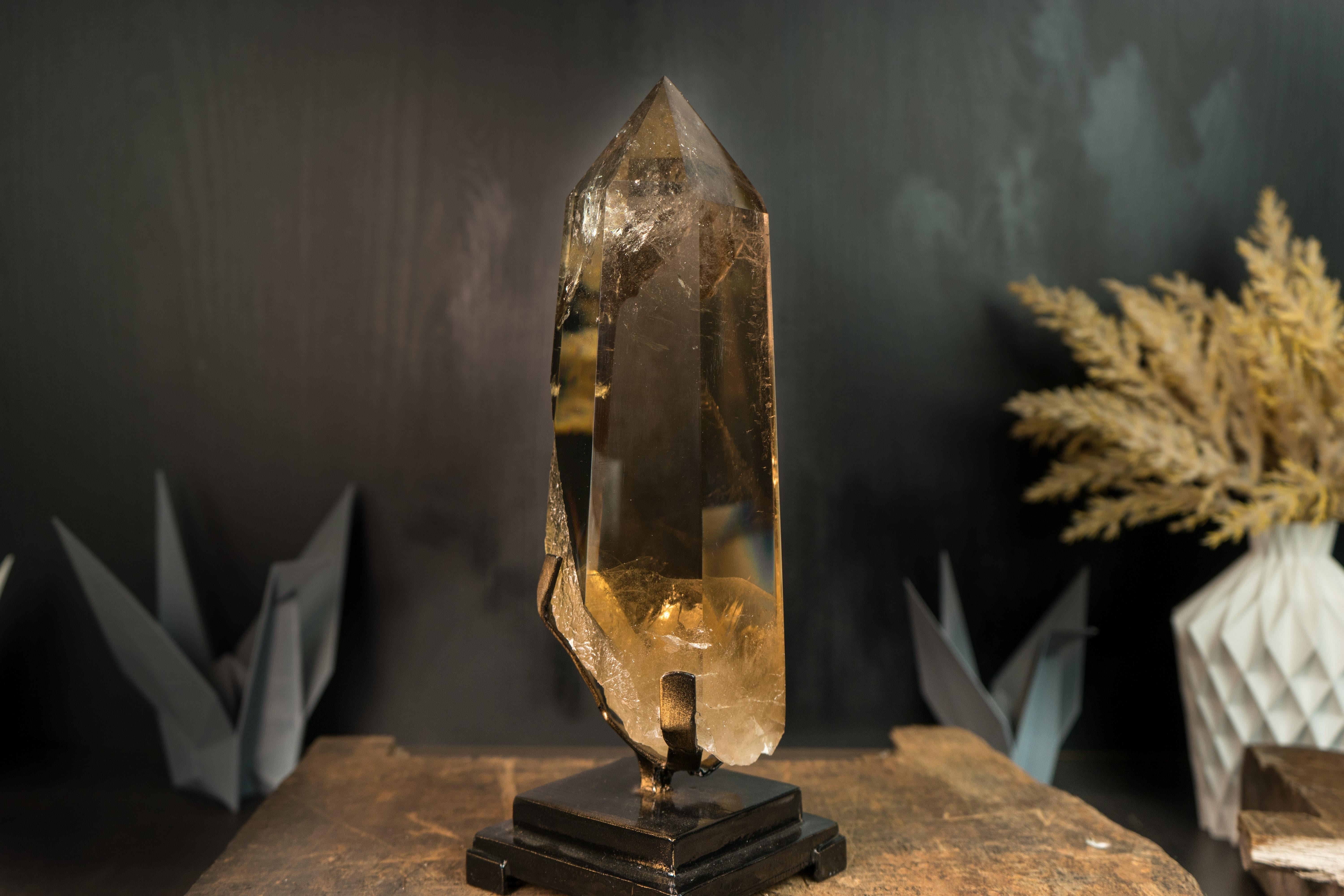 Unmatched in beauty, this Raw, Natural Citrine boasts a gorgeous aesthetic with world-class color in a near-perfect glass-clear interior. A Citrine Tower that makes a statement, this is the perfect specimen for those seeking the ultimate expression