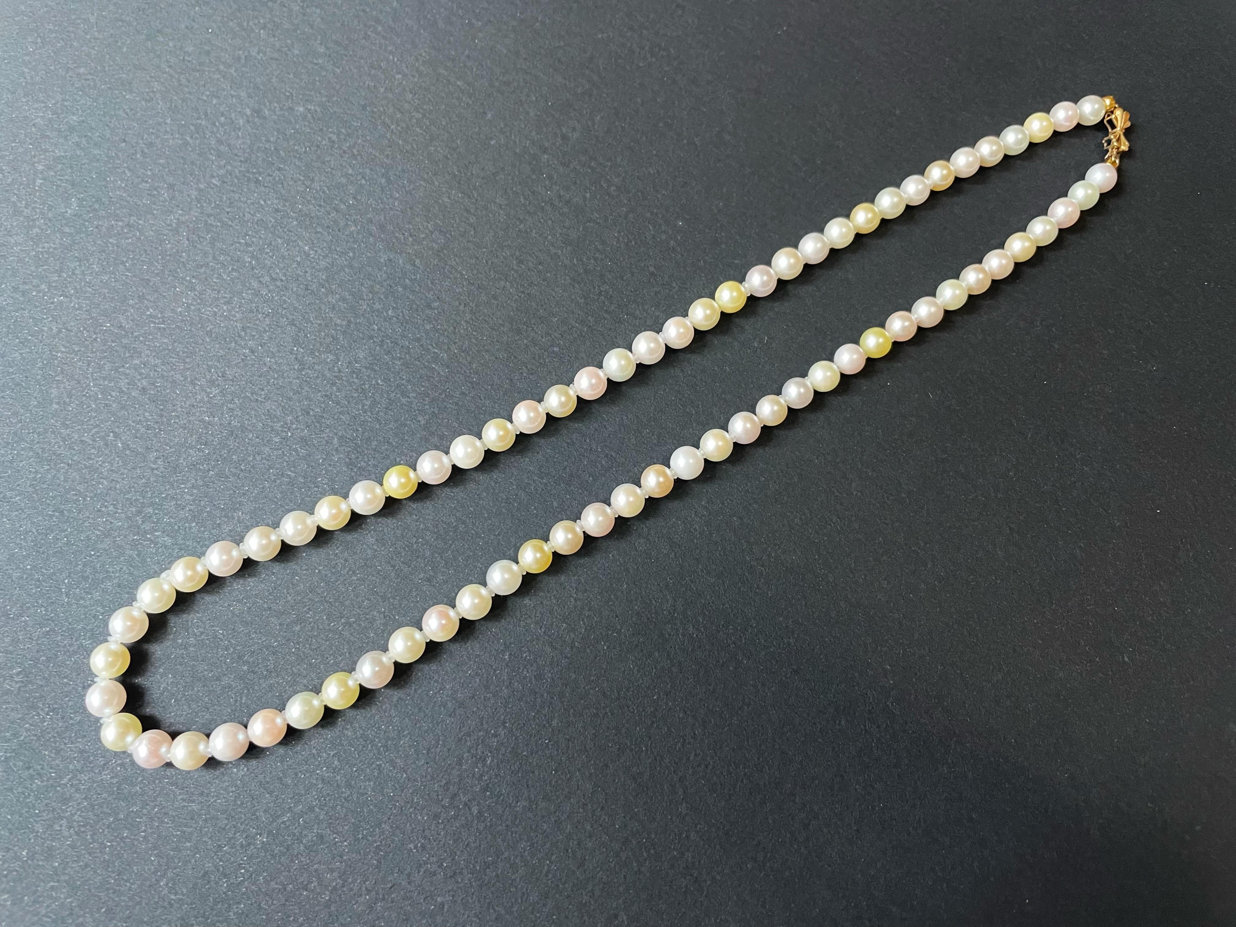Elevate your style with this breathtaking multi-color AAAA grade Akoya pearl necklace, meticulously handcrafted to perfection. Featuring a stunning 14K gold ribbon clasp, this exquisite piece adds a touch of elegance and sophistication, making it a
