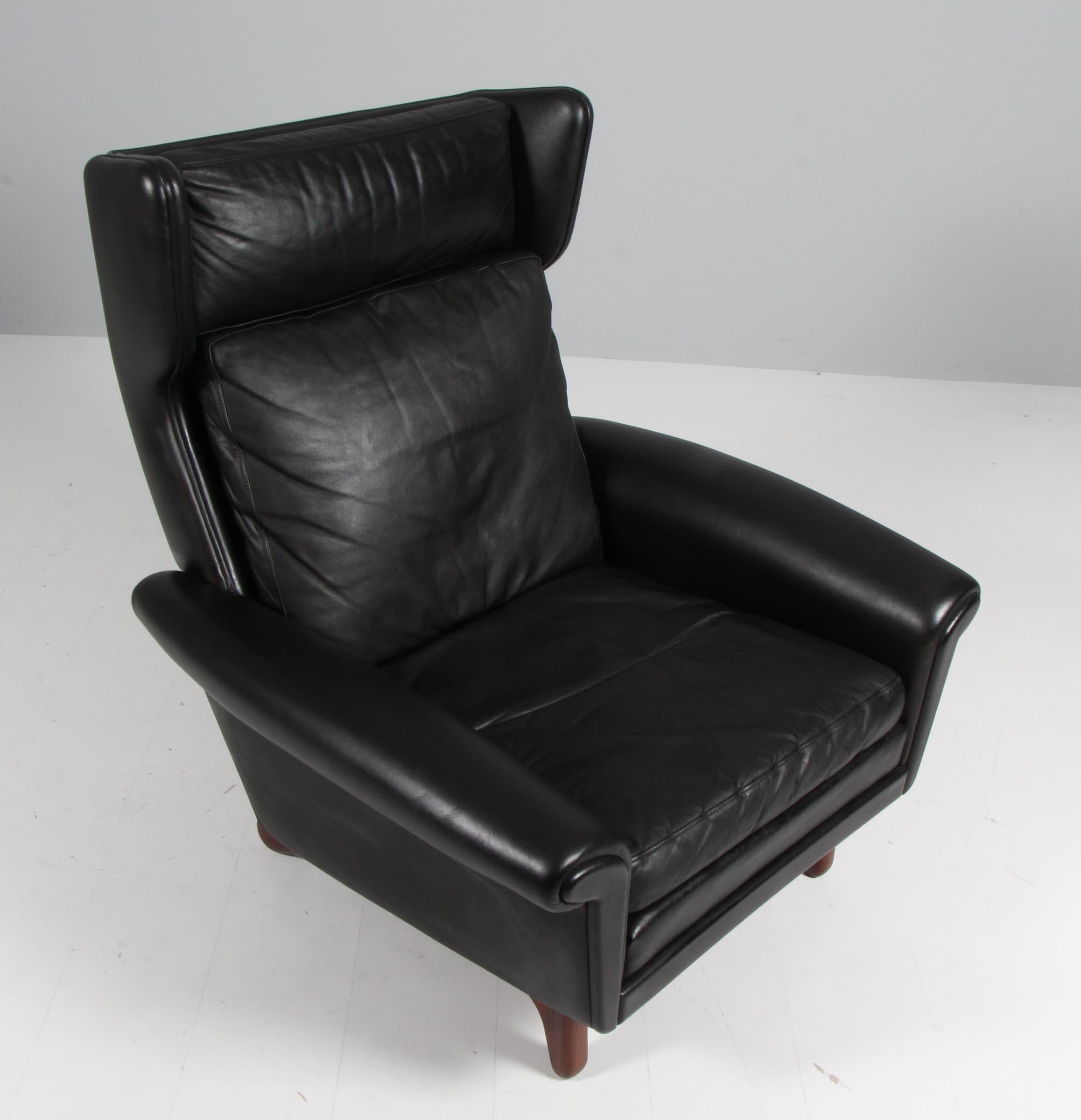 Scandinavian Modern Aage Christiansen for Esra Møbeler. Lounge chair in original black leather. For Sale