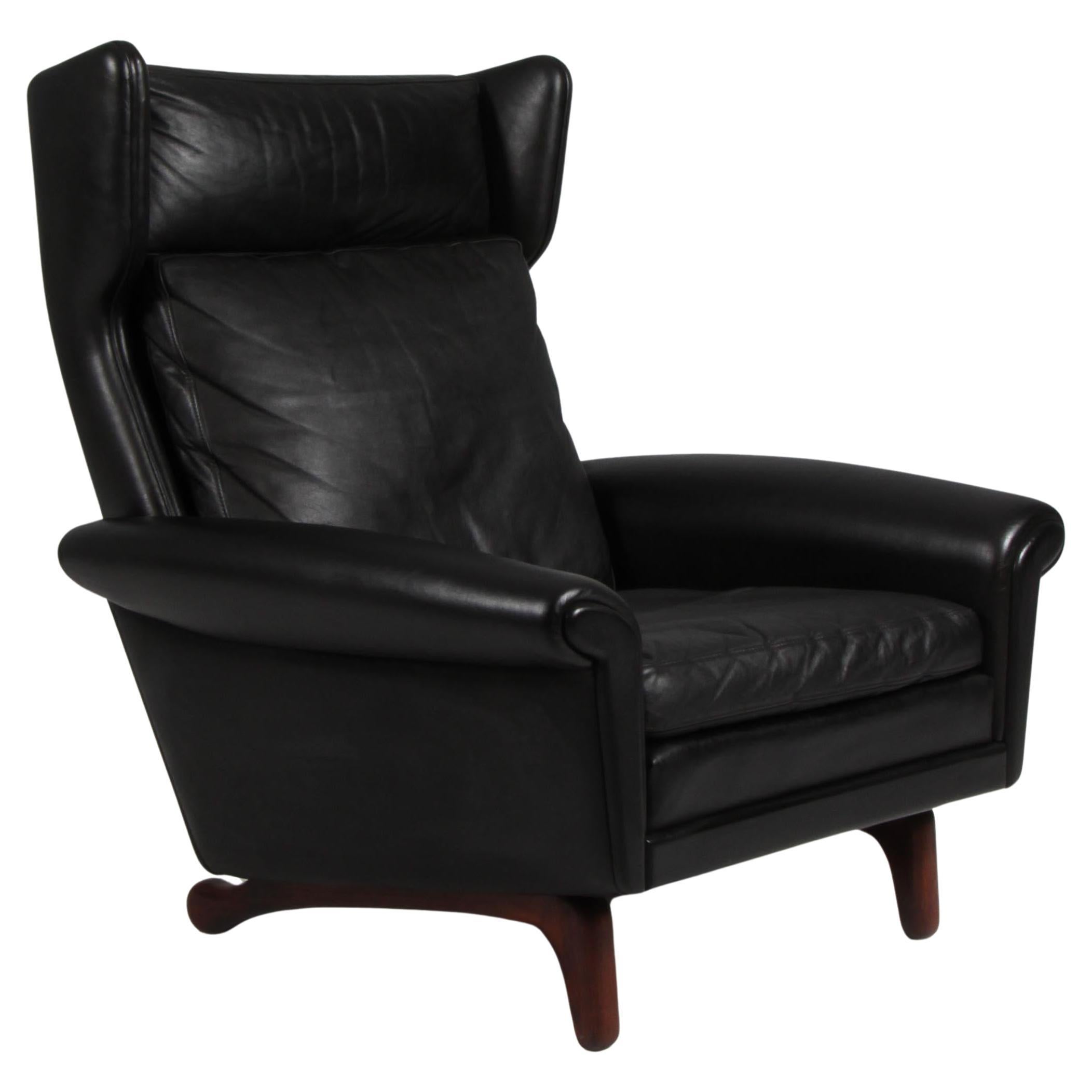 Aage Christiansen for Esra Møbeler. Lounge chair in original black leather. For Sale