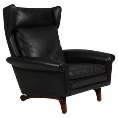 Aage Christiansen for Esra Møbeler. Lounge chair in original black leather.