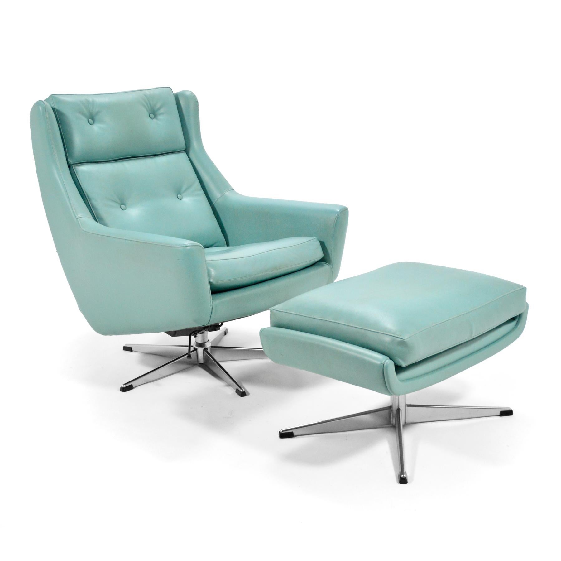 This supremely comfortable lounge chair features swivel function and two positions of locking recline. Designed by Aage Christiansen for Erhardsen & Andersen Denmark, it retains its original faux leather.