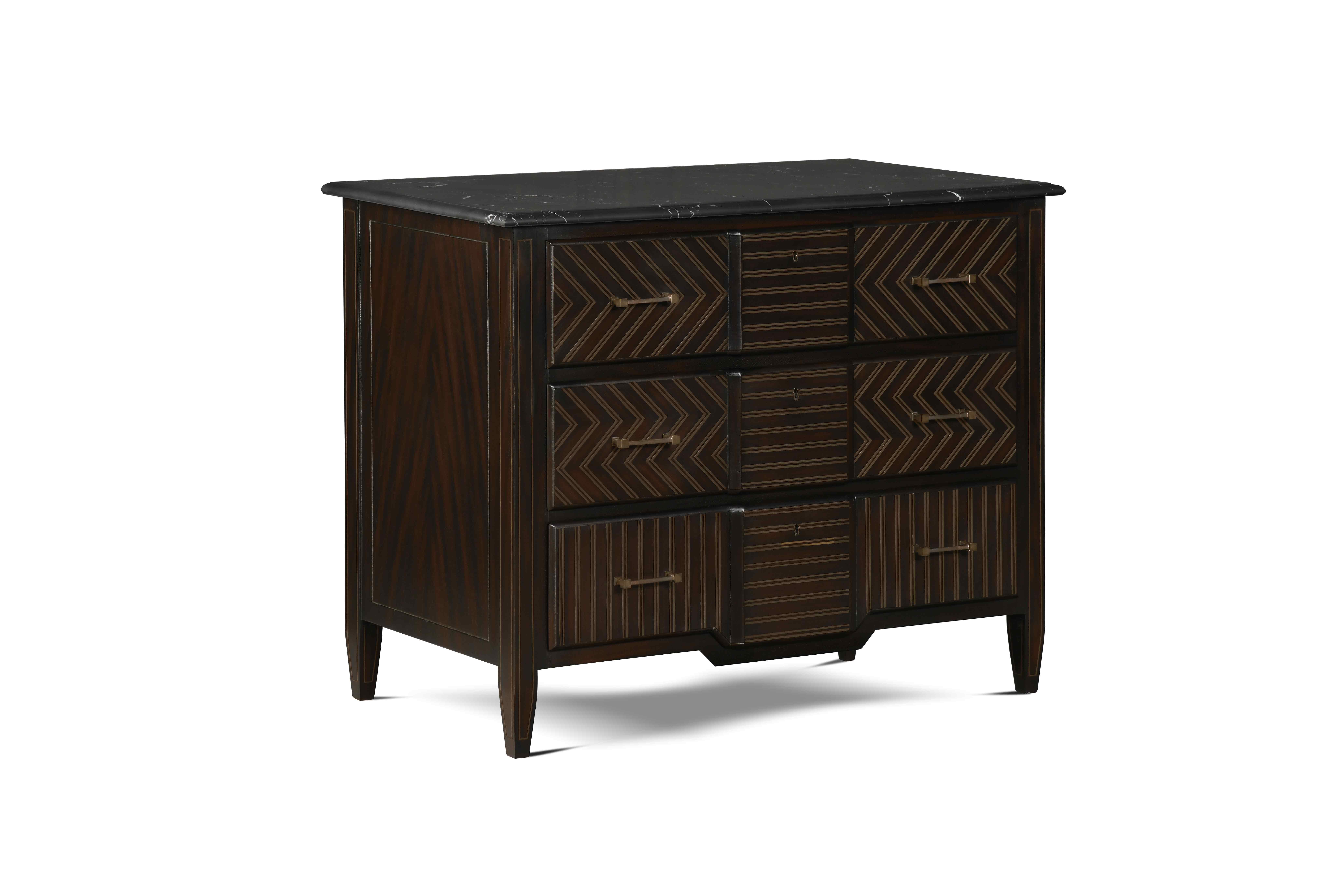 This chest represents the marriage of tradition and modern design. It features hand-placed marquetry that creates a geometric motif. It also has three large drawers and sleek top made with high quality marble. .
