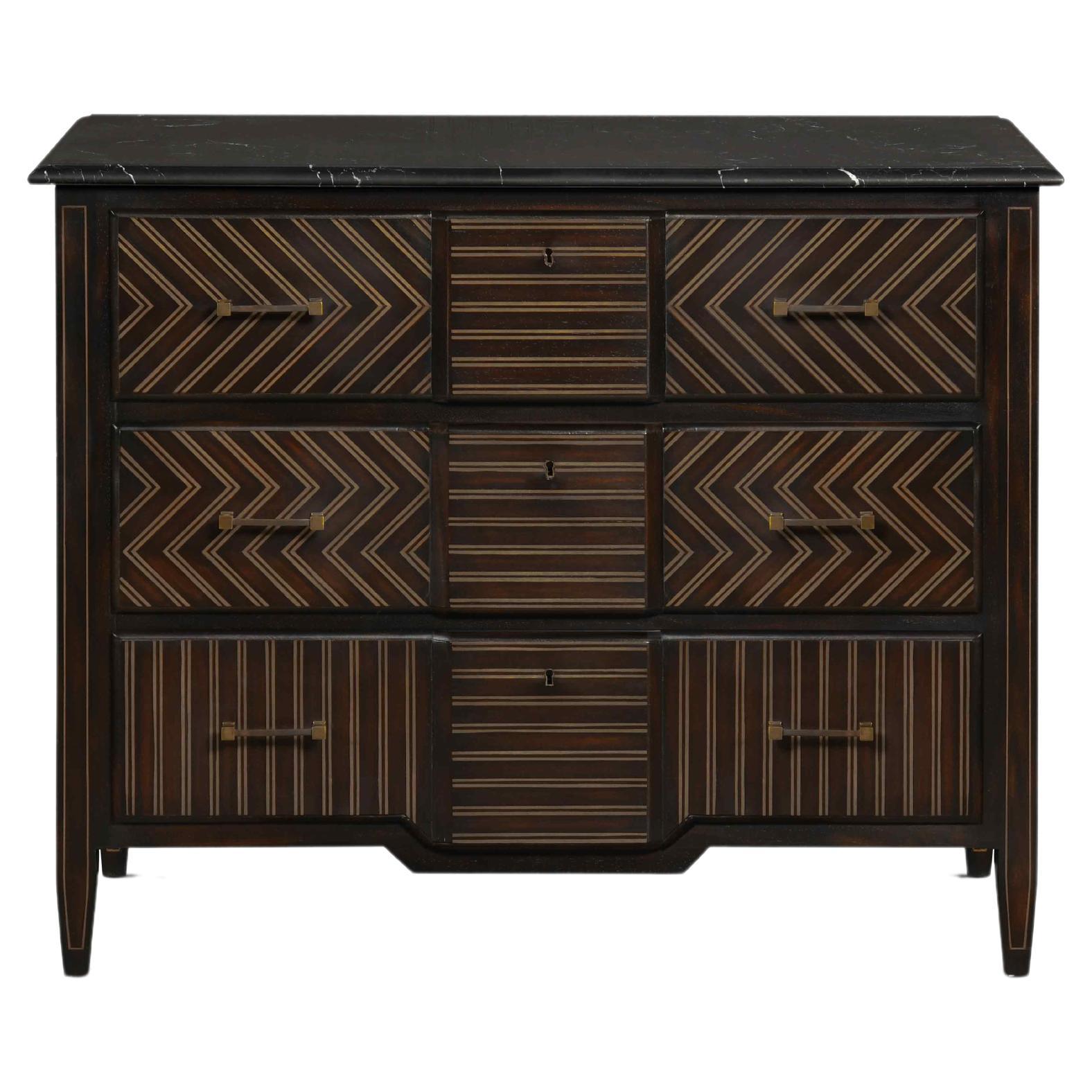 Aalborg small chest with  hand-placed marquetry that creates a geometric motif