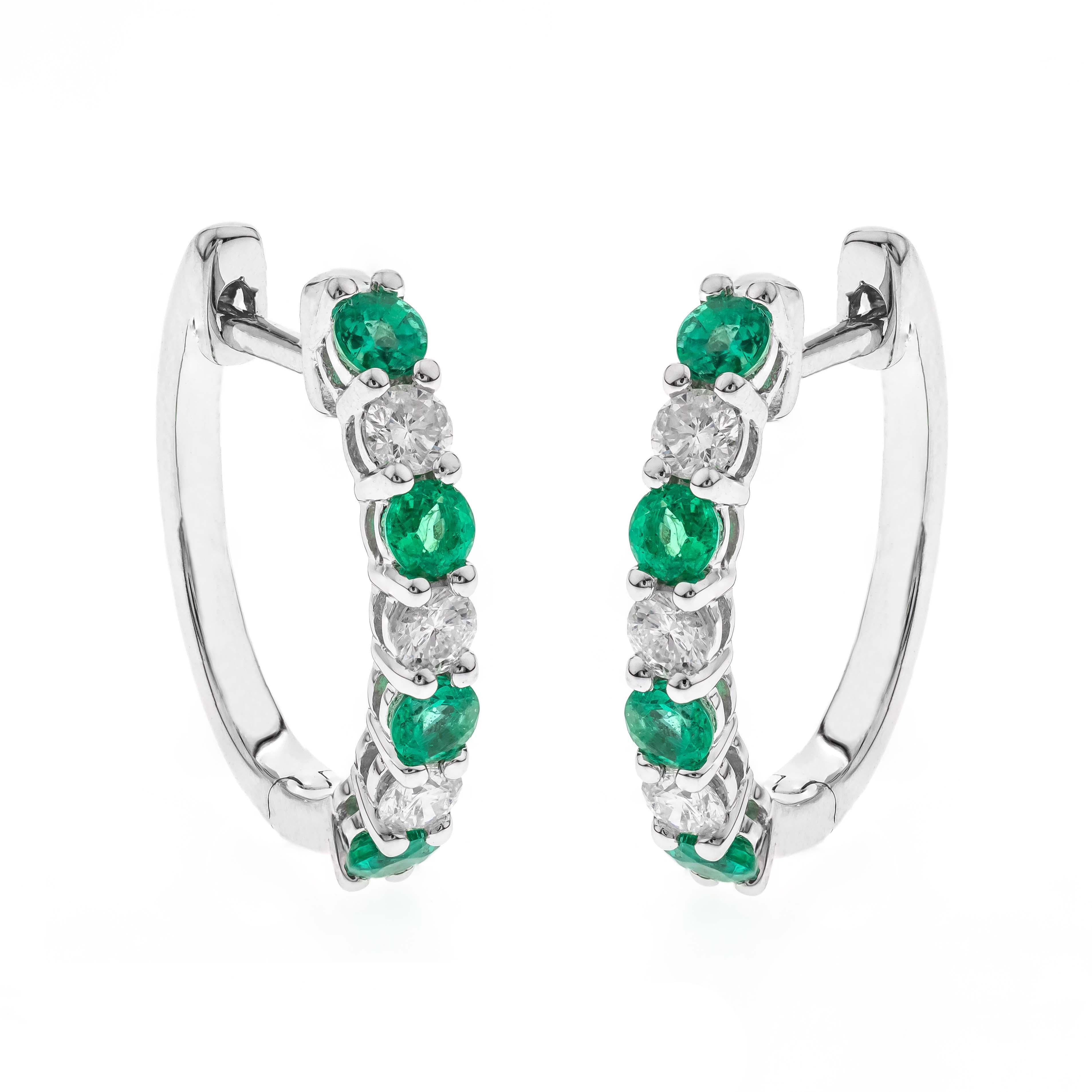 Decorate yourself in elegance with this Earring is crafted from 14-karat white Gold by Gin & Grace. This Earring is made up of emerald Round-cut (8 pcs) 0.54 carat and Round-cut White Diamond (6 Pcs) 0.35 Carat. This Earring is weight 3.00 grams.