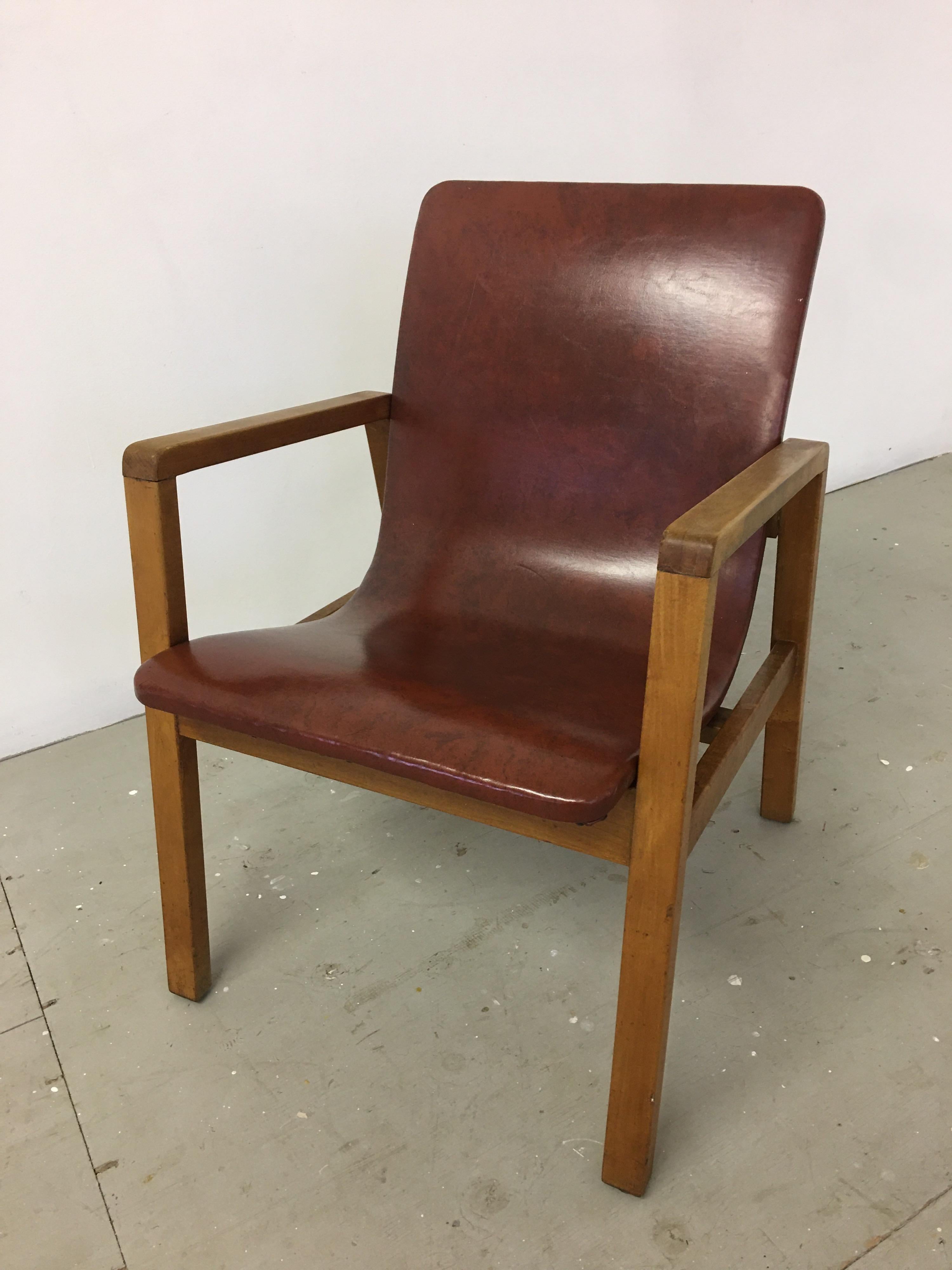 Aalvo Aalto for Artek Hallway chair Model 403 in it's original brown vinyl covering. Chair retains it's original label to underside.