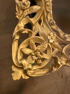 An Antique French Carved Giltwood Wall Mirror
