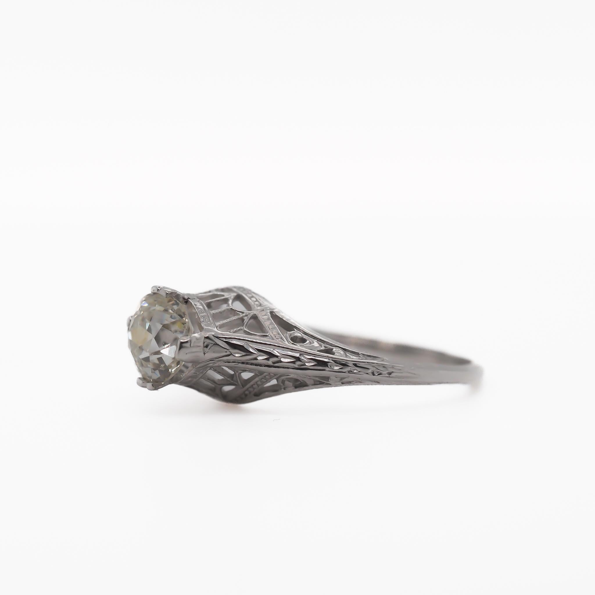 Item Details:
Ring Size: 6
Metal Type: 14K White Gold
Weight: 2.2 grams

Center Diamond Details
Shape: Old Miner Cut
Carat Weight: .96ct
Color: J
Clarity: VS2

Finger to Top of Stone Measurement: 7.91mm