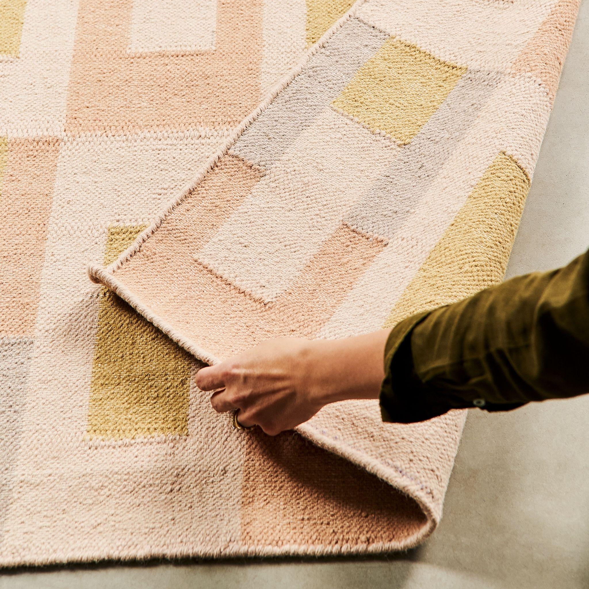 Aari Rug has been carefully handwoven by heritage artisans in India . Handwoven completely on our custom design , we are using 100% hand-carded jute and imported wool and cotton.

No petrochemical based yarns like acrylic / polyester are used in