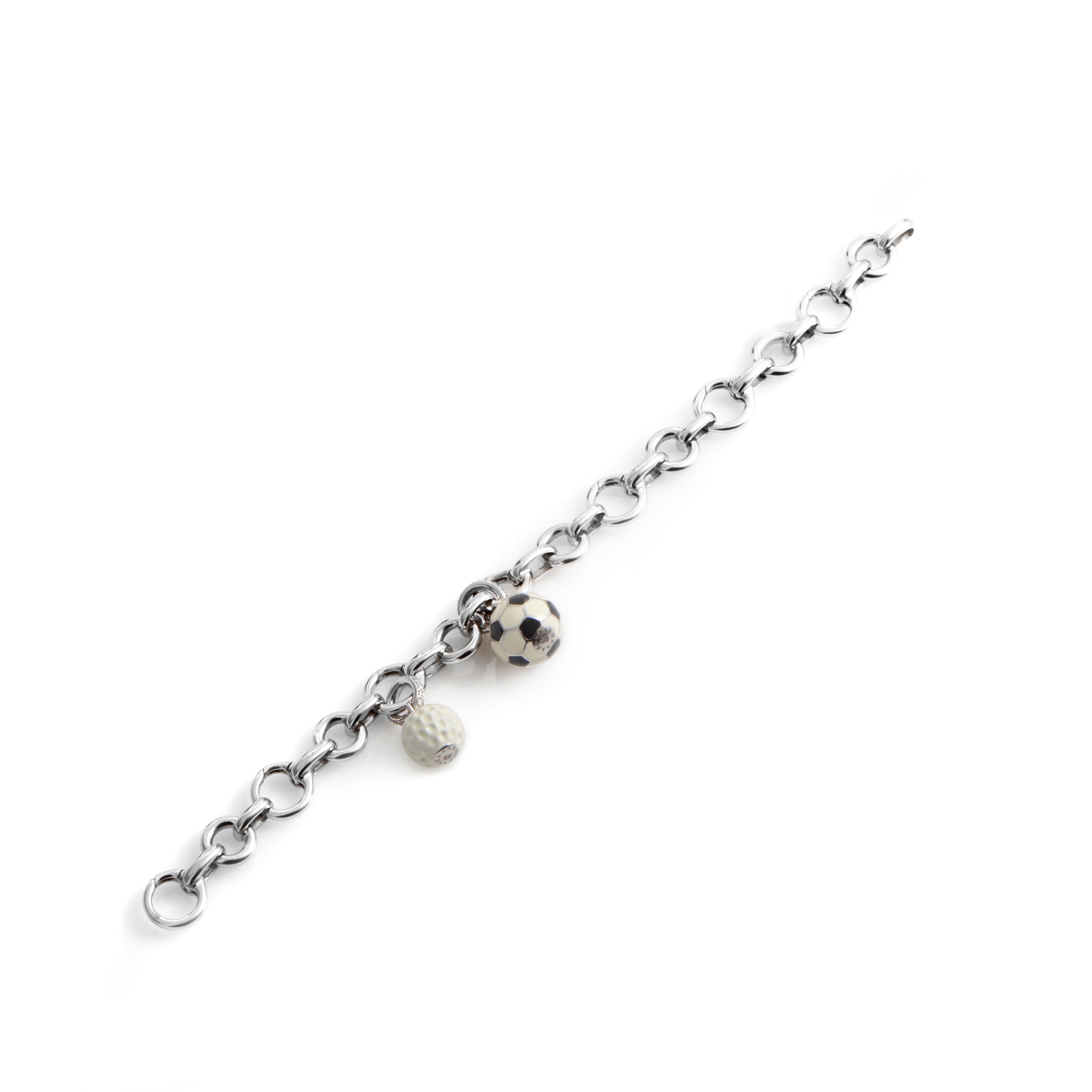 Indulge yourself with this fantastically designed charm bracelet from Aaron Basha! The bracelet is made of 18K white gold and is comprised of heart-shaped links. Dangling from the links are a lacquered golf ball and soccer ball charm.