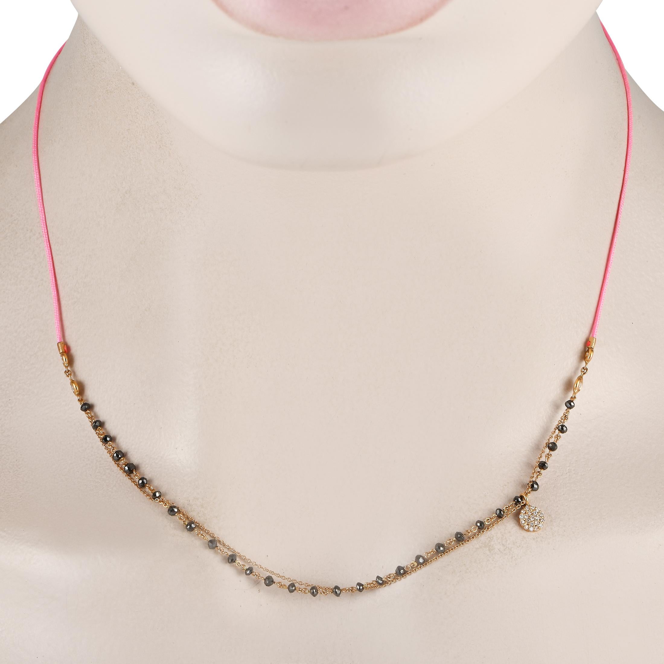 Incredibly dynamic in design, this Aaron Basha necklace exudes upscale bohemian elegance. This playful piece juxtaposes a pink silk cord with an opulent 18K Rose Gold chain. Black diamond beading offers plenty of extra visual impact, totaling 1.30