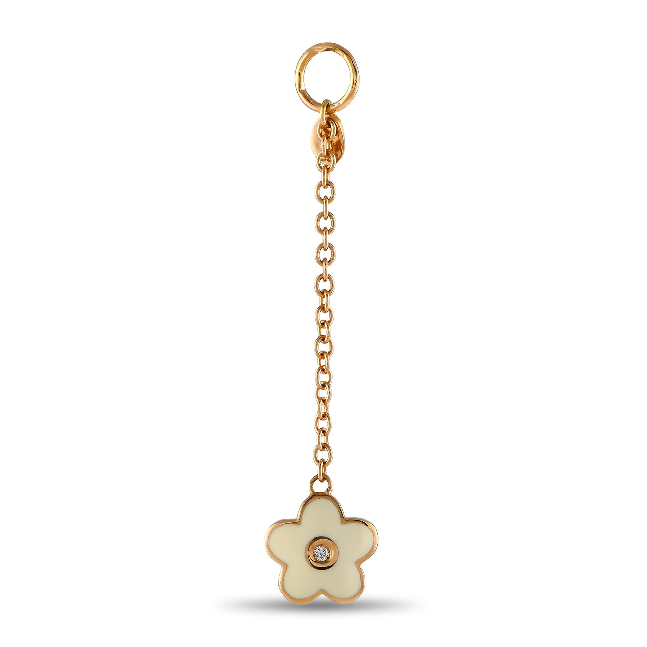 A cute little flower for your dear daughter. This Aaron Basha charm is crafted in 18K rose gold. It features a flower charm in creamy white enamel, dotted at the center with a lone diamond. The bloom hangs from a short rose gold chain. It measures
