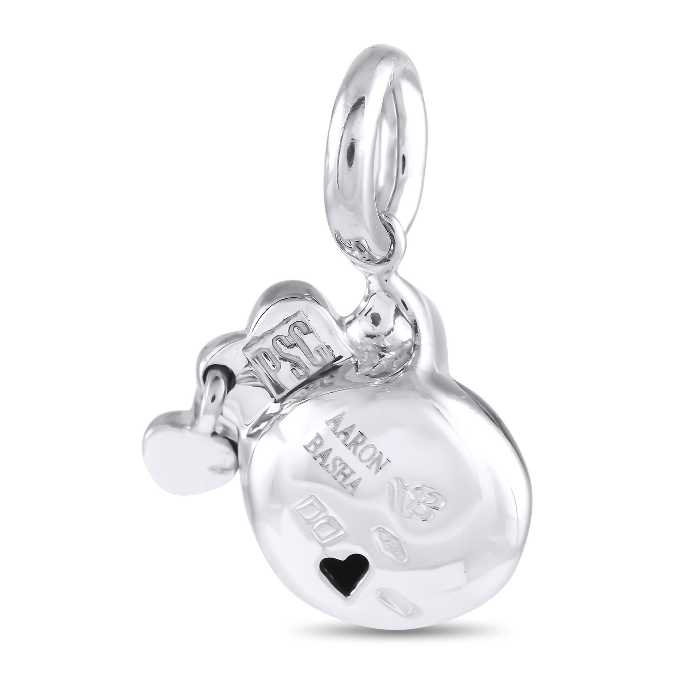 Give your charm bracelet a whimsical update by adding this playful Aaron Basha charm. Set in white gold and meticulously finish in enamel, it features the face of a blushing girl with a red bow.This brand new Aaron Basha 18K White Gold Enamel