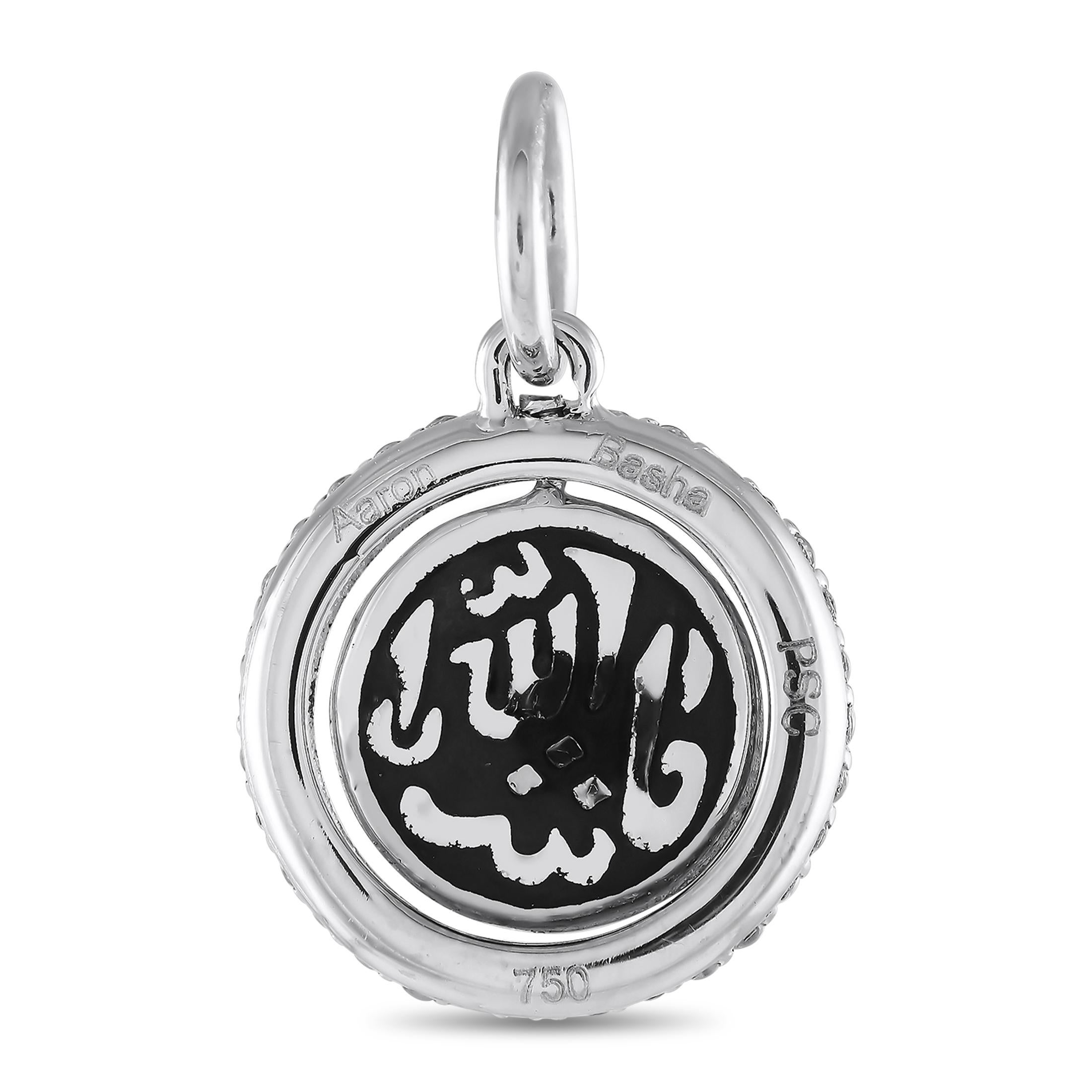 Ward off negativity in style with this diamond-framed evil eye charm from Aaron Basha. The disc charm is made out of 18K white gold and has a blue enamel center with a black and white ring in the middle. The edges of this charm is traced by