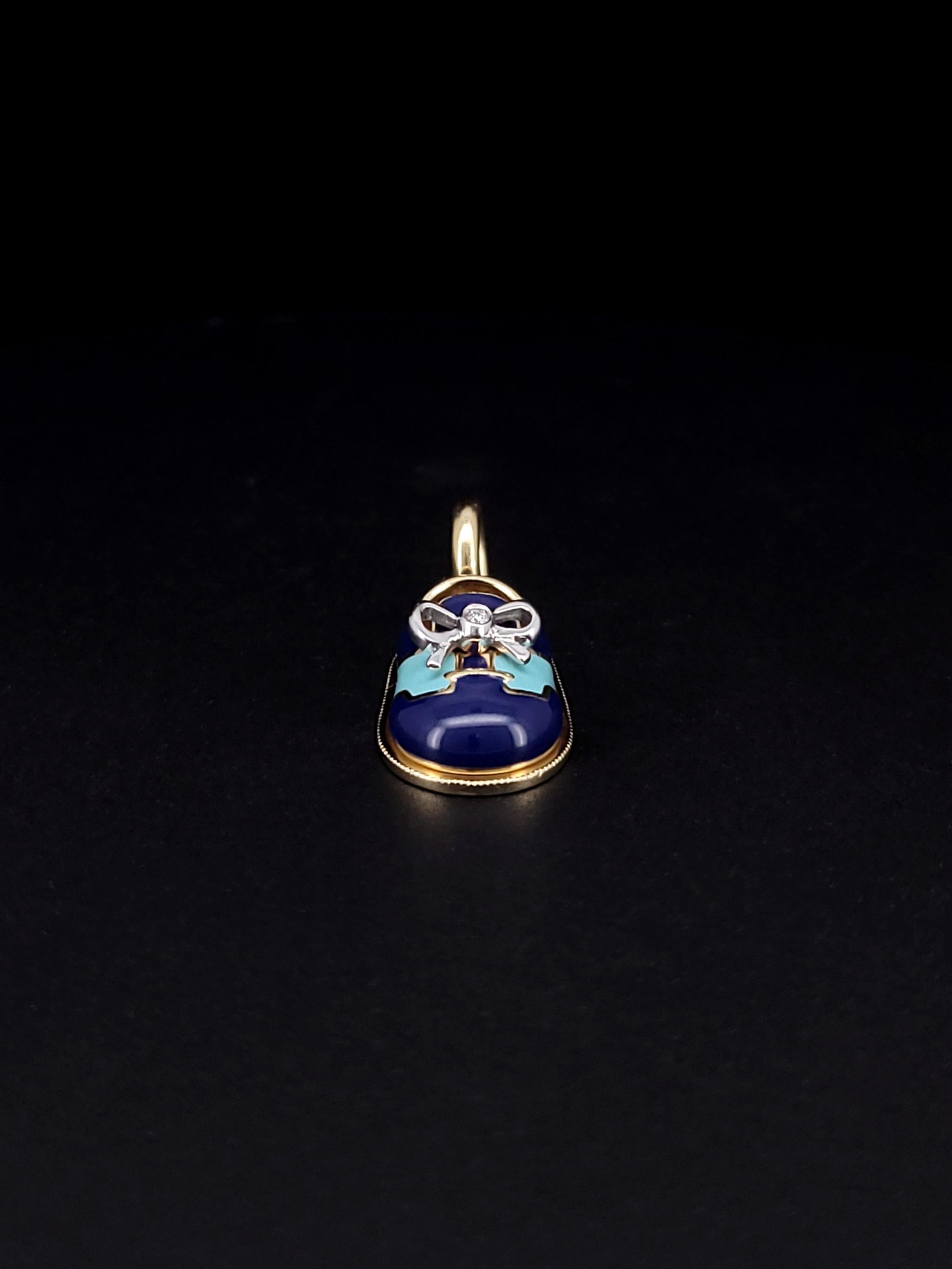 Carry a reminder of the brand-new little boy who's filled your heart and life with joy. This light blue and navy baby saddle shoe charm by Aaron Basha is an everyday reminder of the whimsy boys bring to life. It's made of 18kt yellow gold and