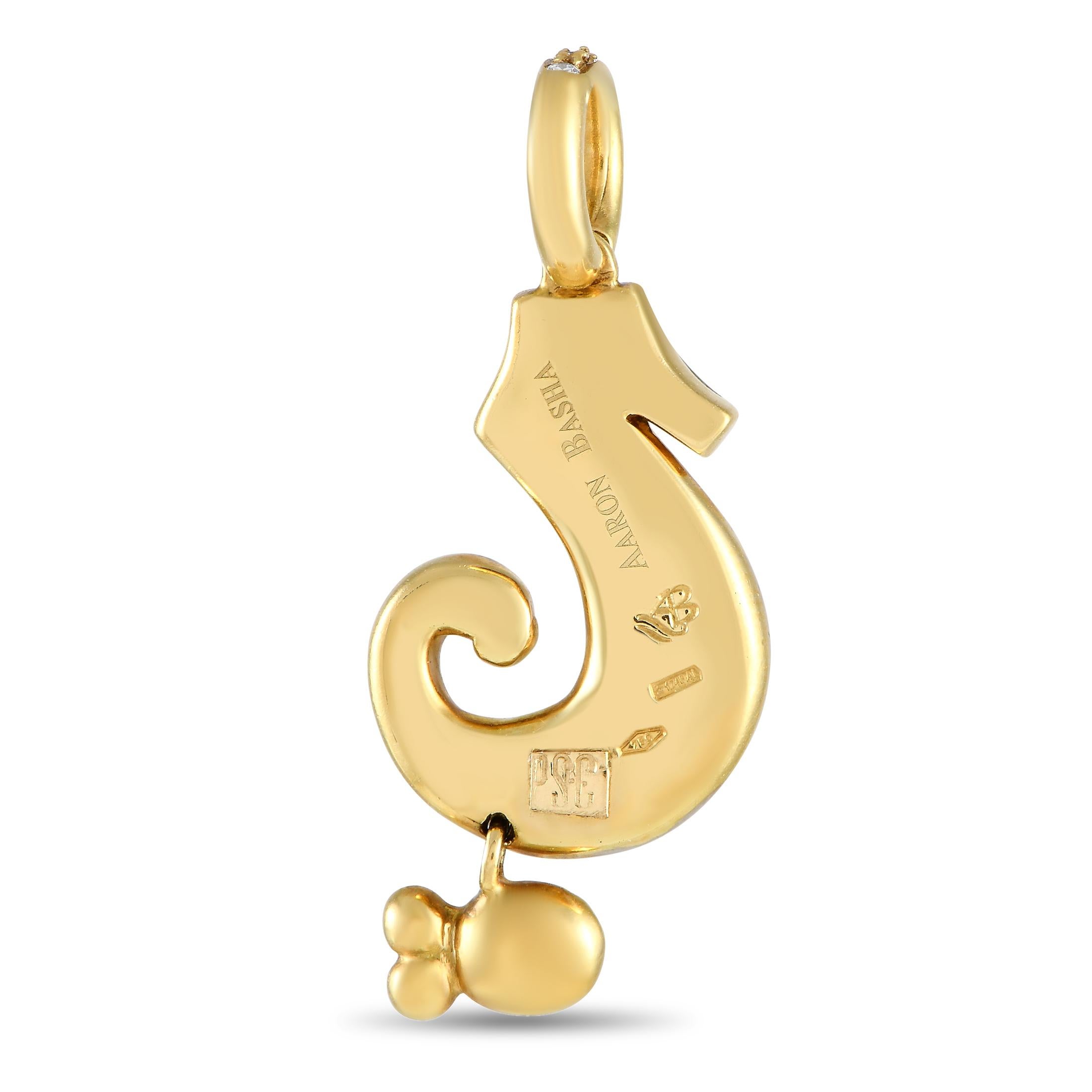 Here is a precious trinket with the kind of whimsy fit for lovers of the sea. An Aaron Basha creation, this yellow-gold charm (that can also be worn as a pendant) features a sculpted black enamel seahorse and a red enamel fish. Both sea creatures