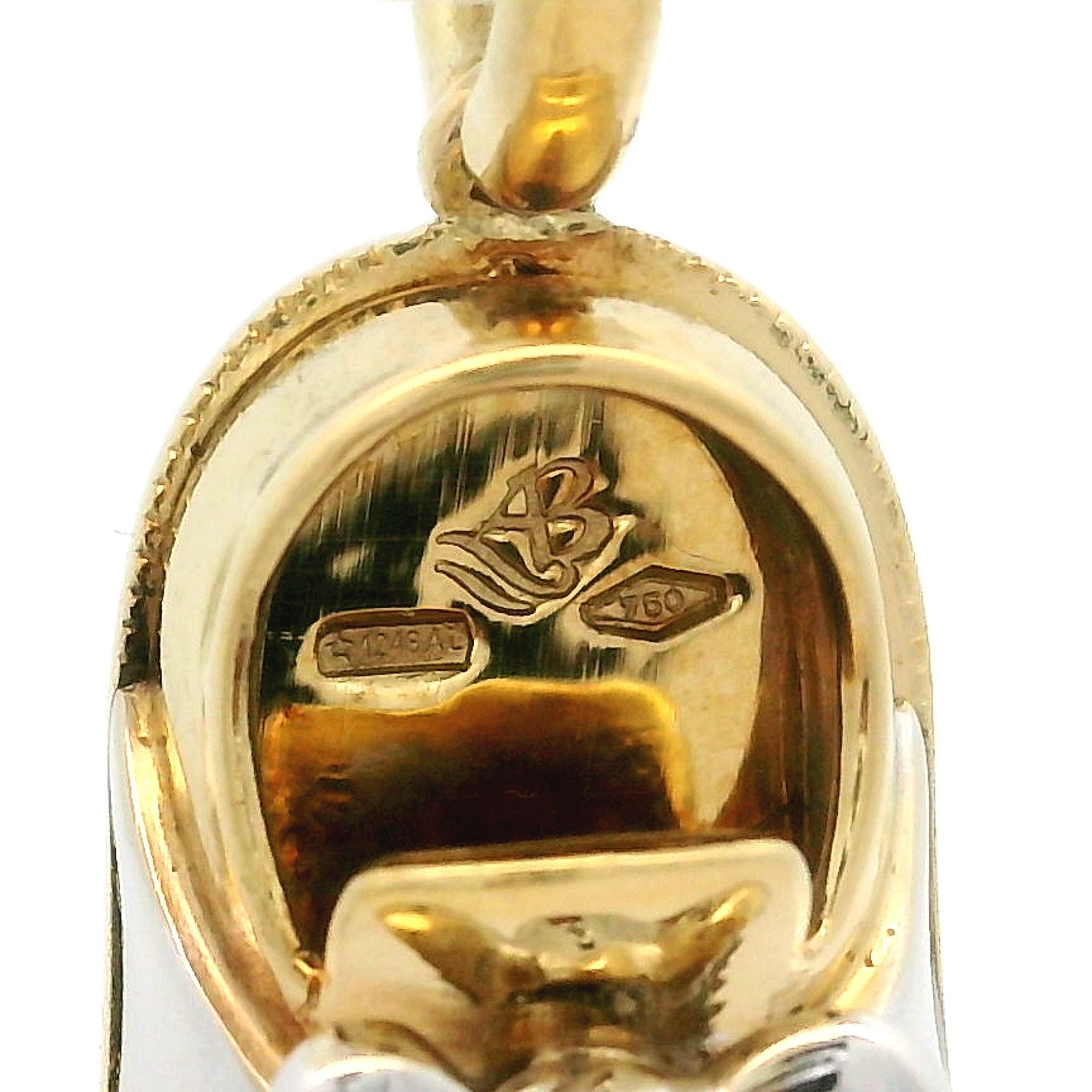 --Stone(s):--
(1) Natural Genuine Diamond - Round Brilliant Cut - Bezel Set - White Color

Material: 18k Solid Yellow Gold w/ White Gold Accents
Weight: 7.18 Grams
Overall Width: 10.9mm (0.43